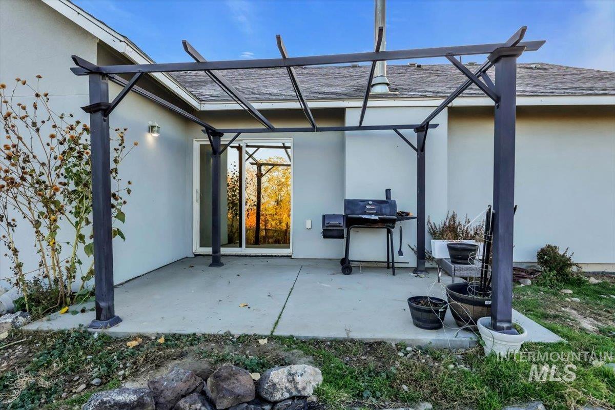 View of patio / terrace featuring a grill