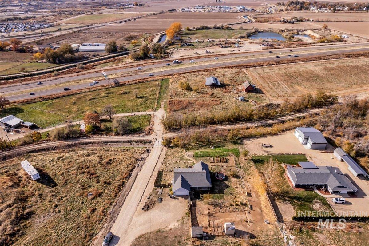 Aerial overview of property's location featuring rural landscape