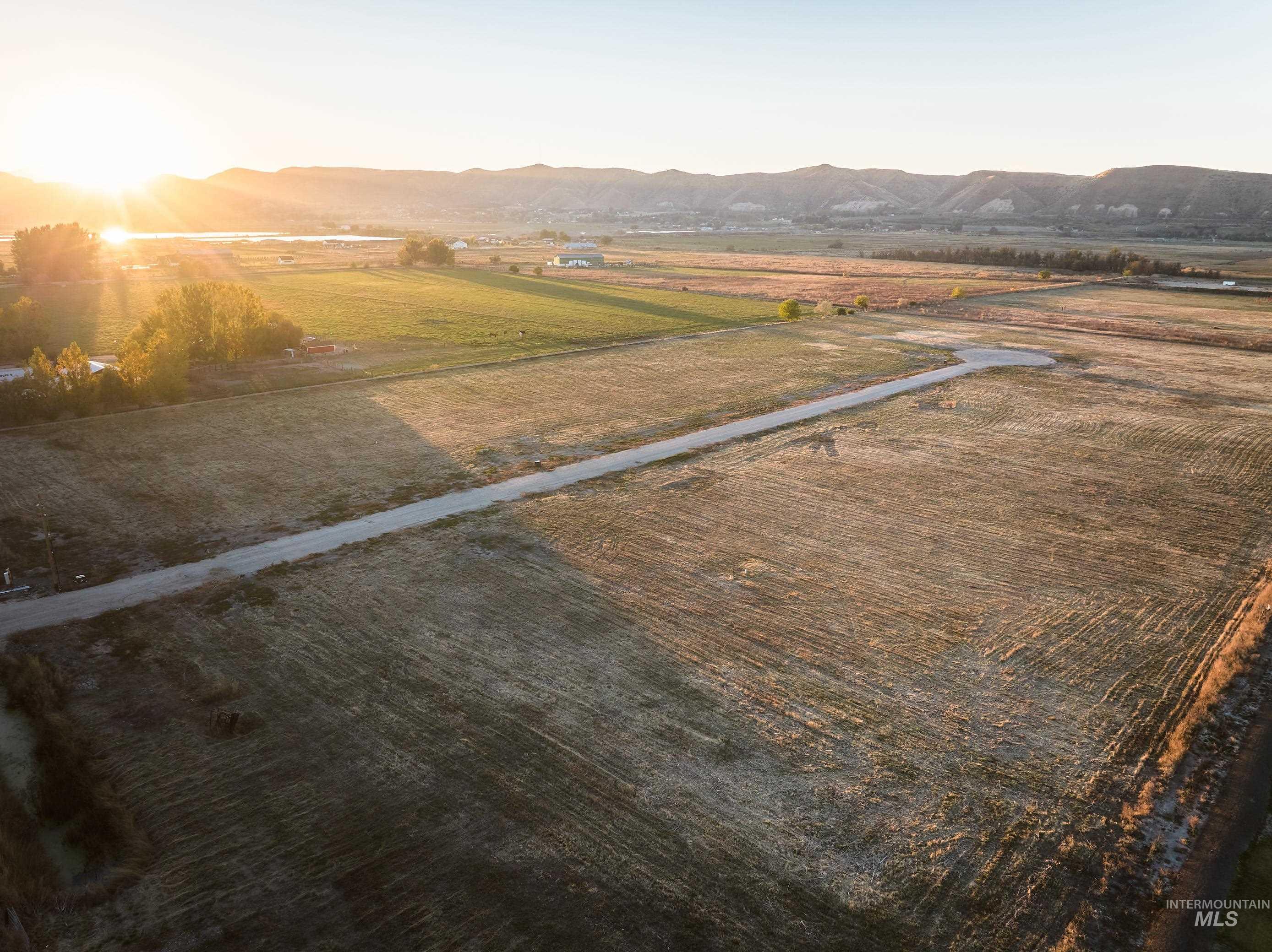 Mountain view with rural landscape and large plots for crops