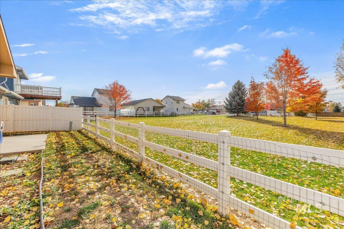 View of fenced backyard