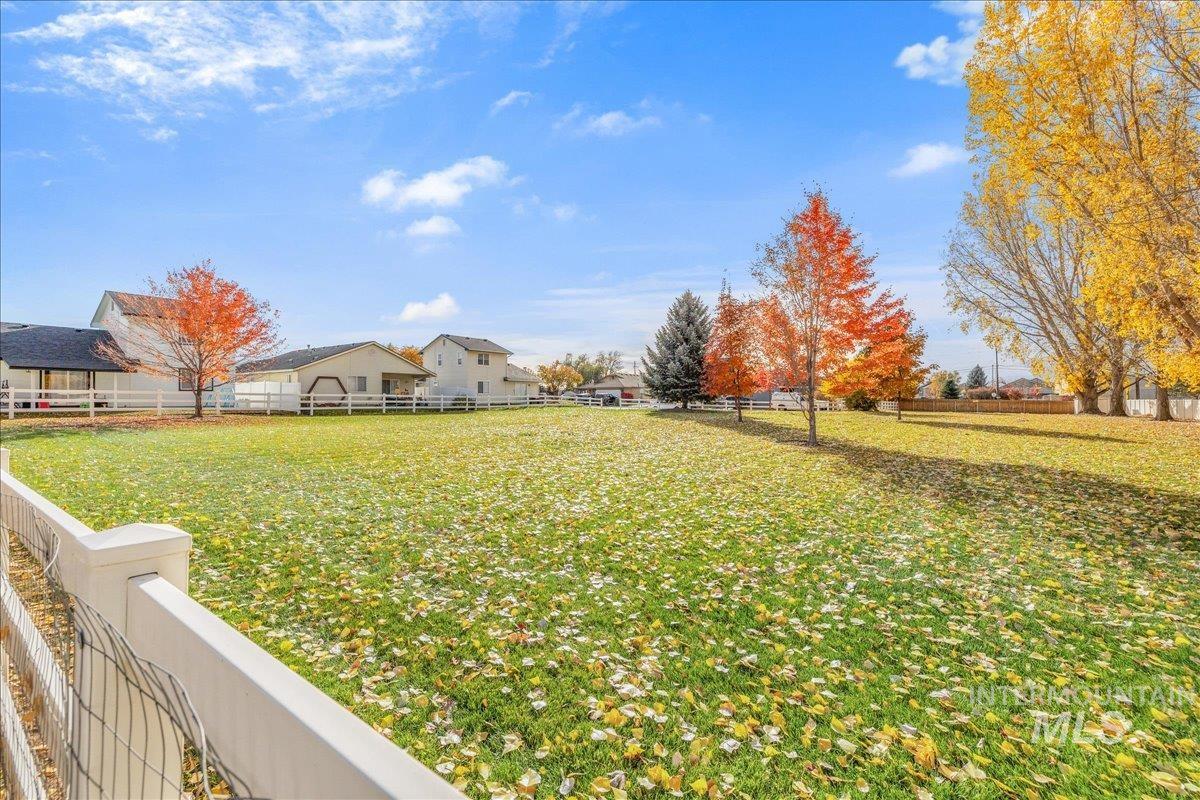 View of fenced backyard
