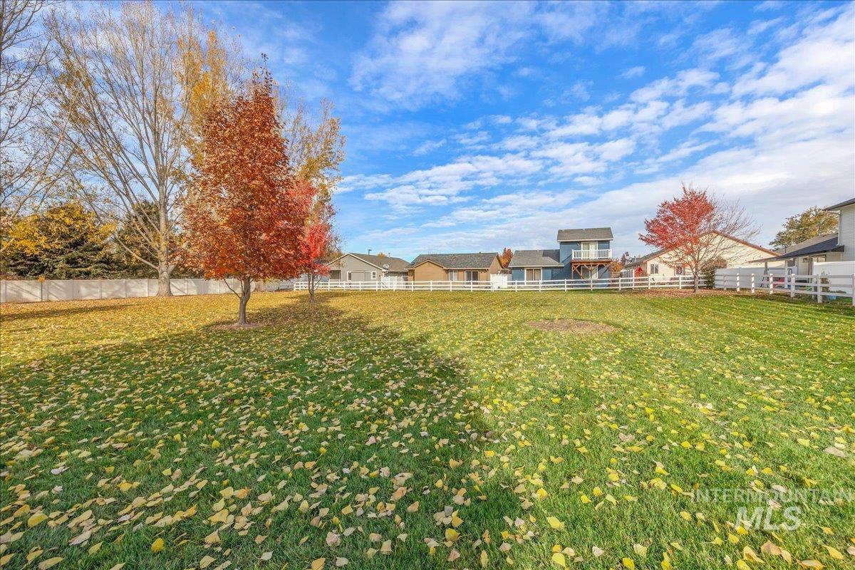 View of fenced backyard