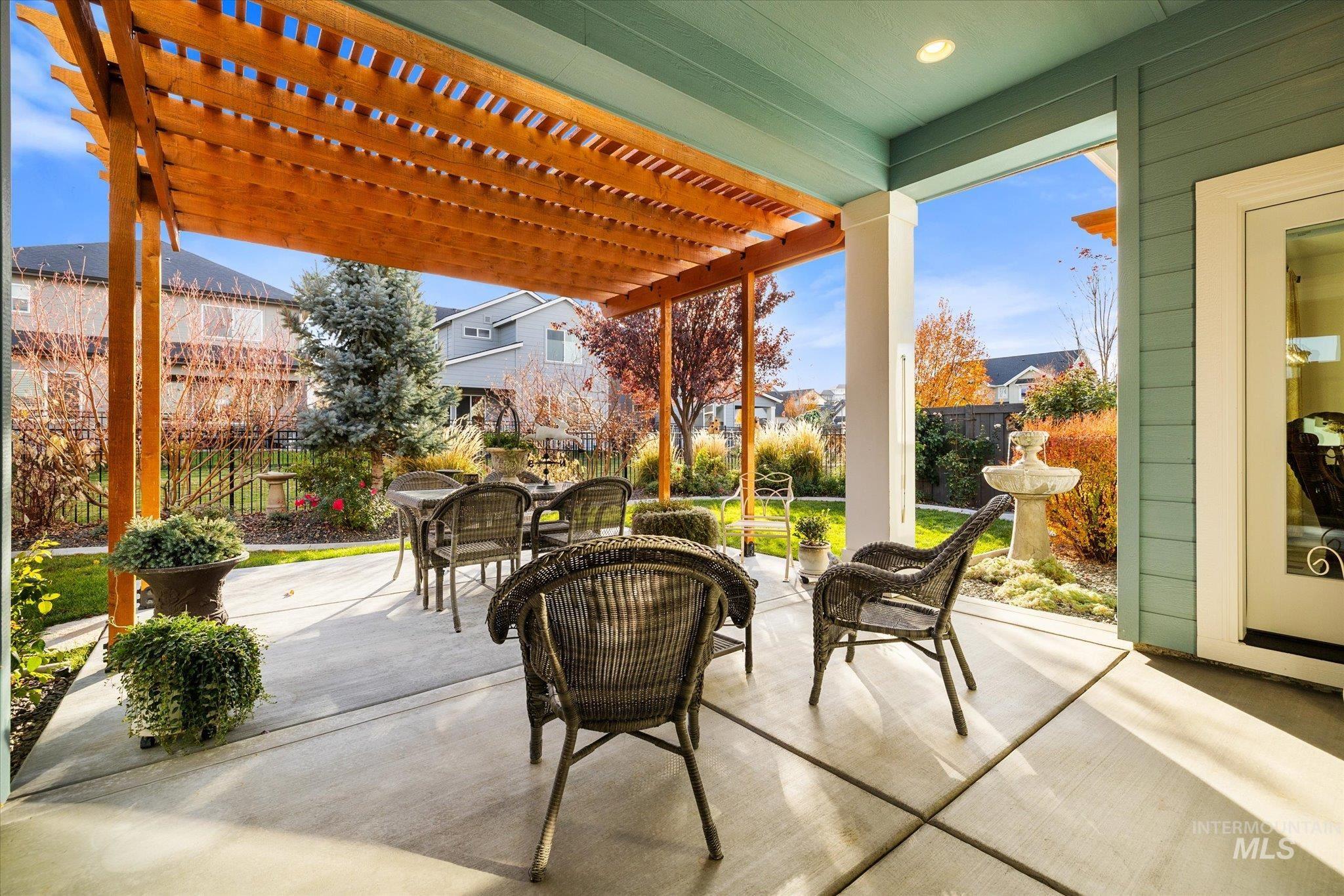 View of patio / terrace with a pergola and outdoor dining area