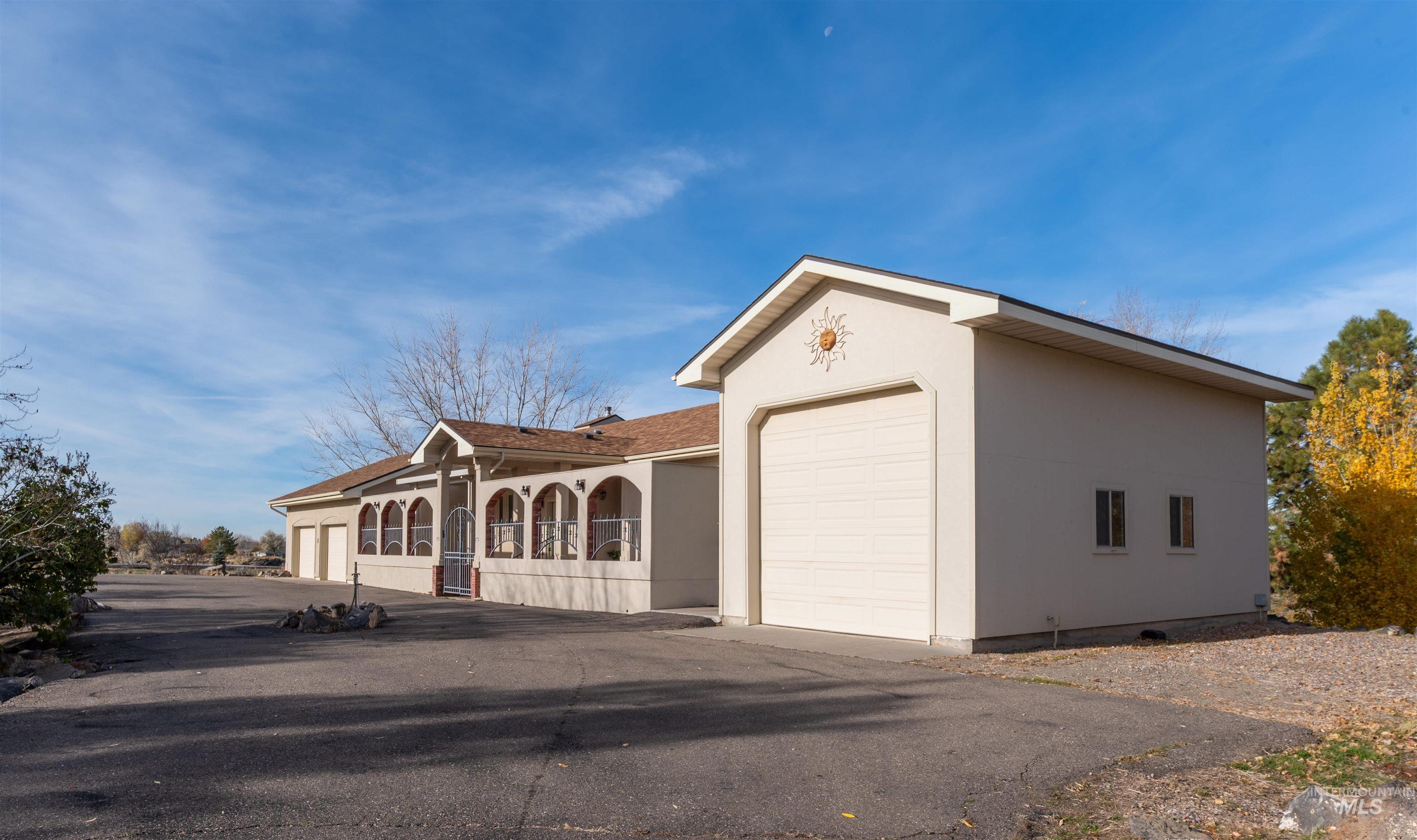 View of front of home featuring stucco siding