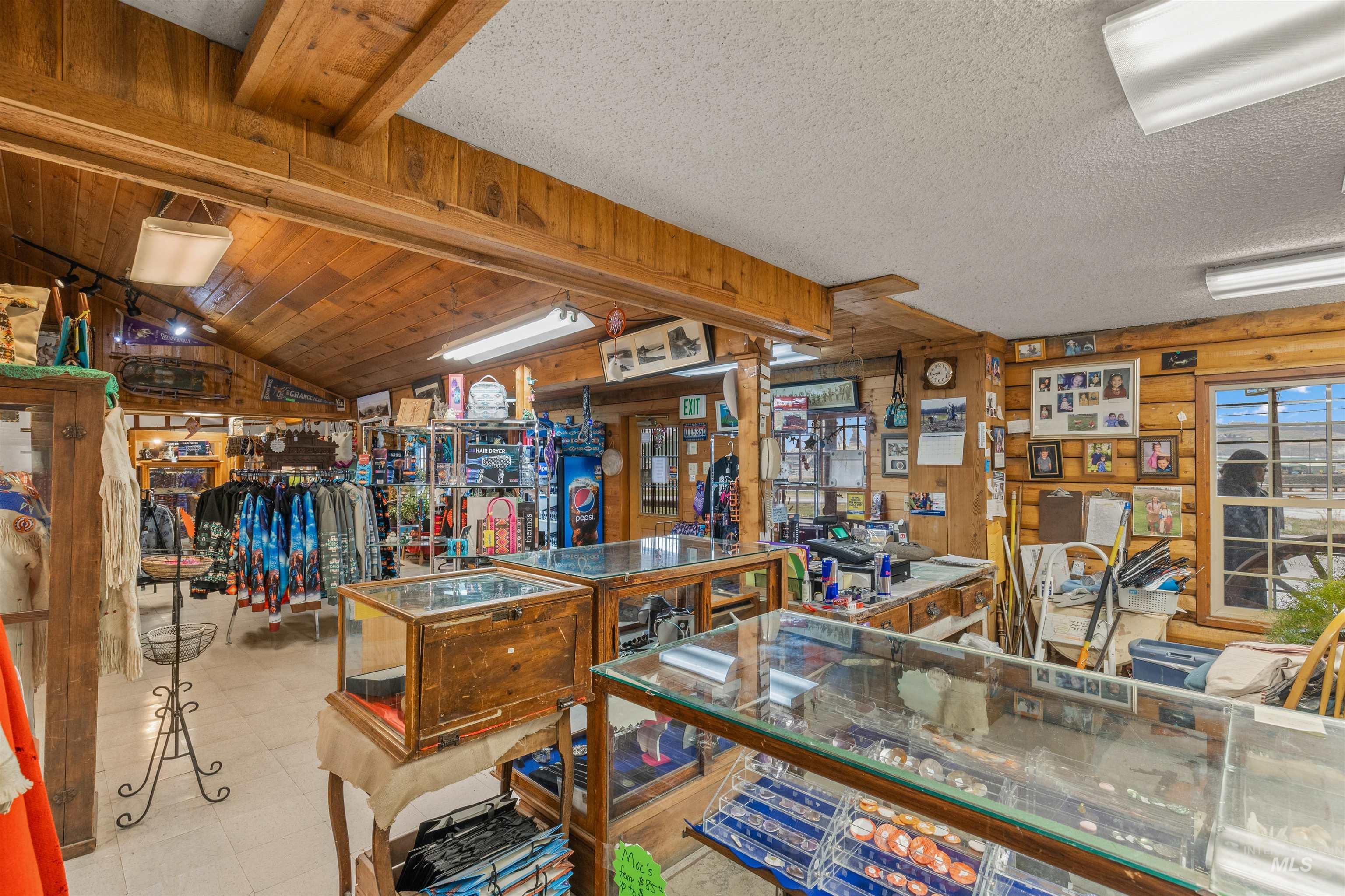 Miscellaneous room featuring wood walls