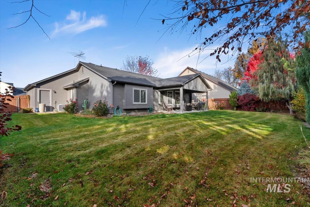 Back of property featuring a patio area