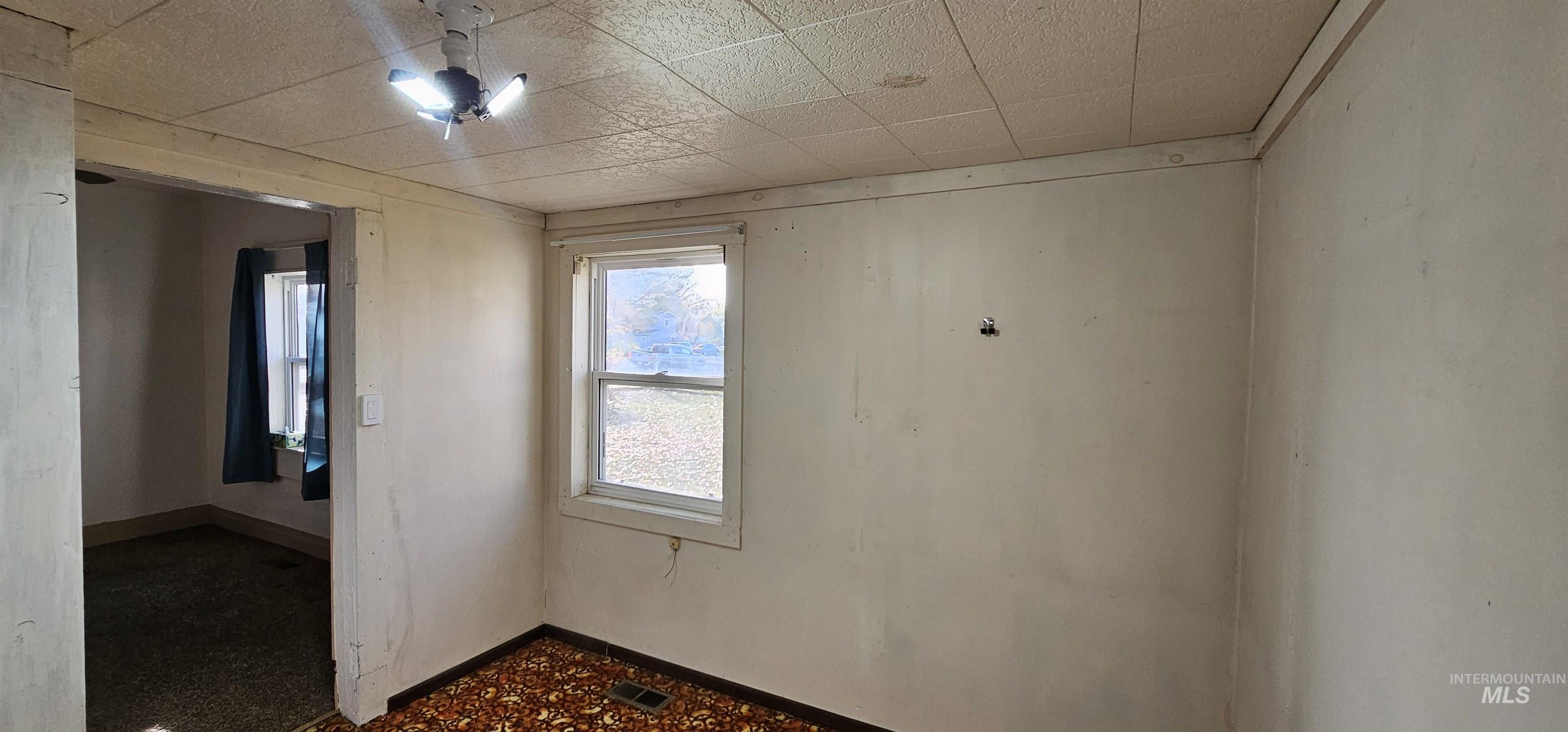 Empty room with baseboards
