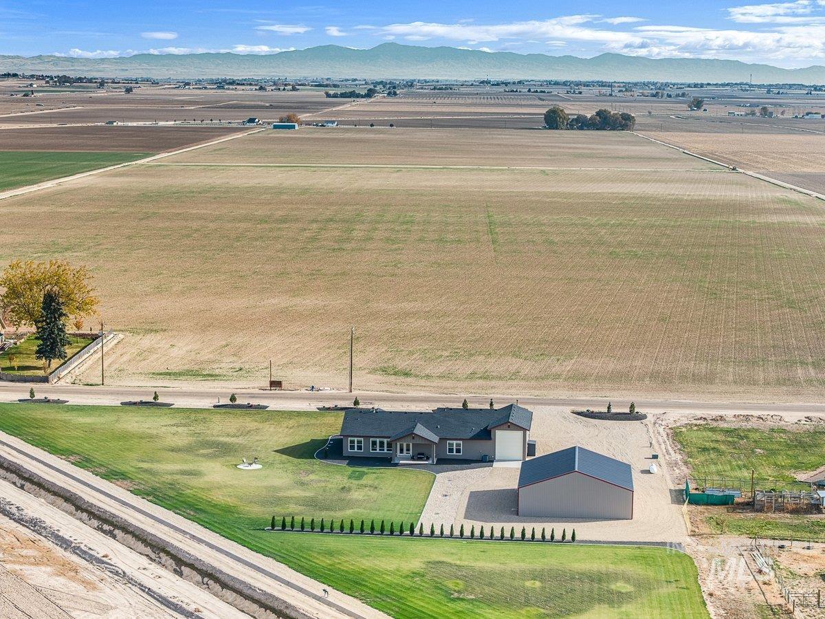 View of rural area with a mountain backdrop