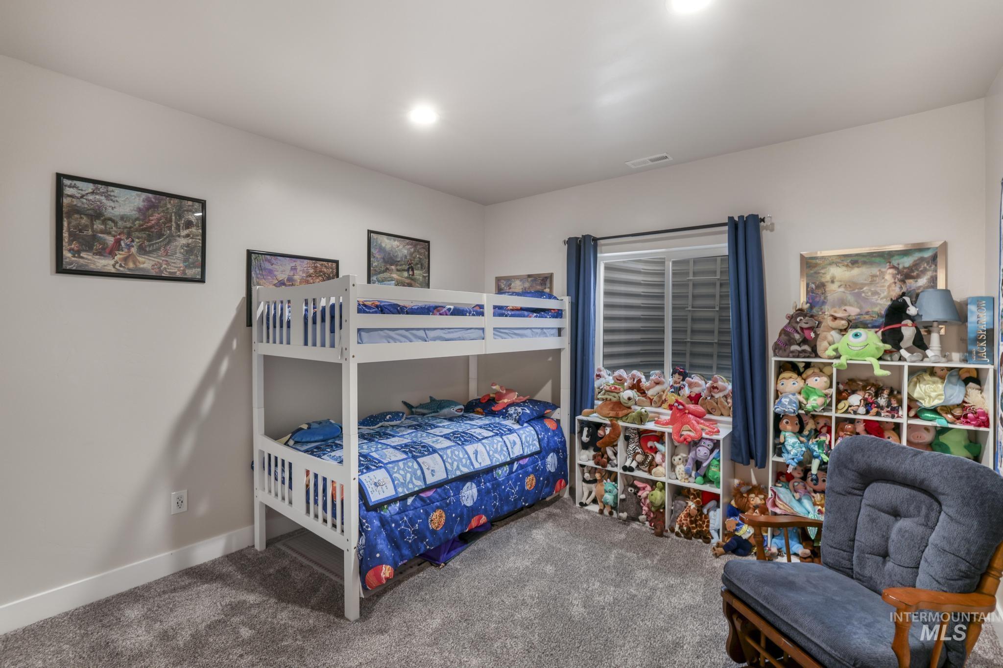 Bedroom featuring carpet and recessed lighting