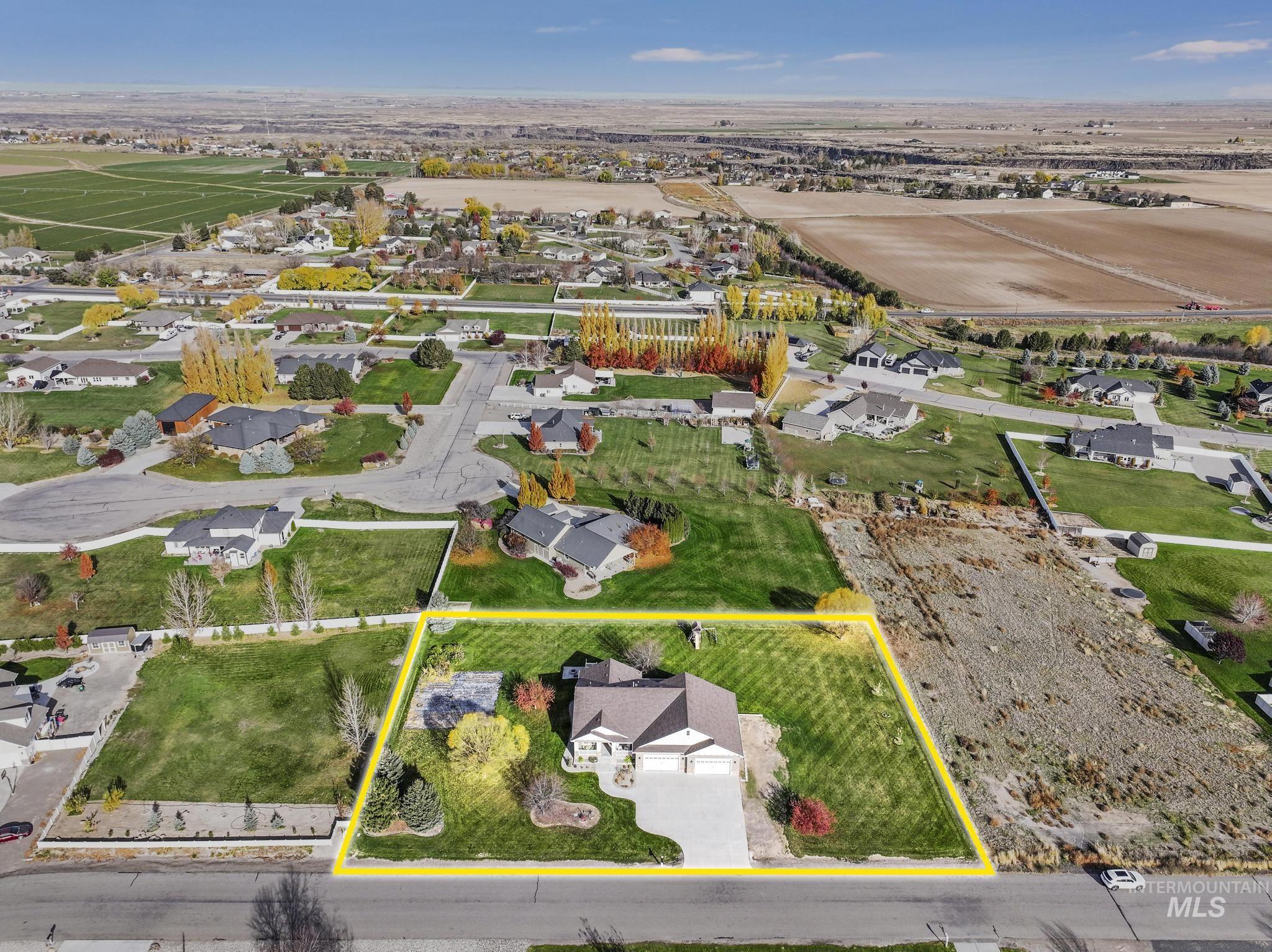 Aerial perspective of suburban area with property boundaries highlighted