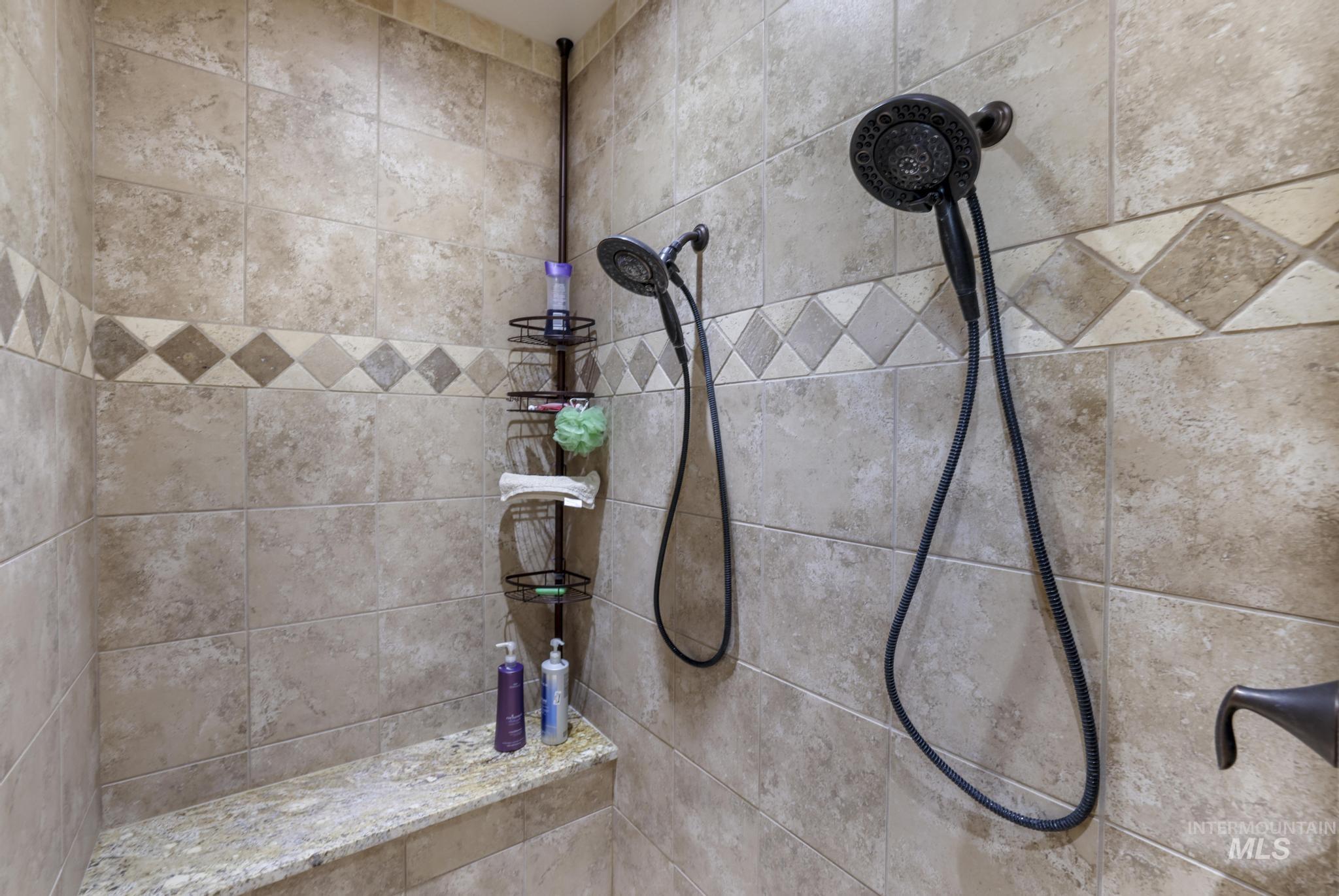 Bathroom view of tiled shower