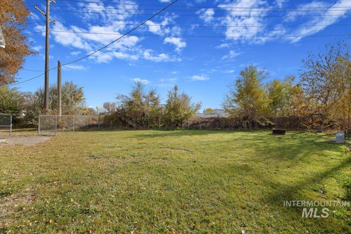 View of fenced backyard