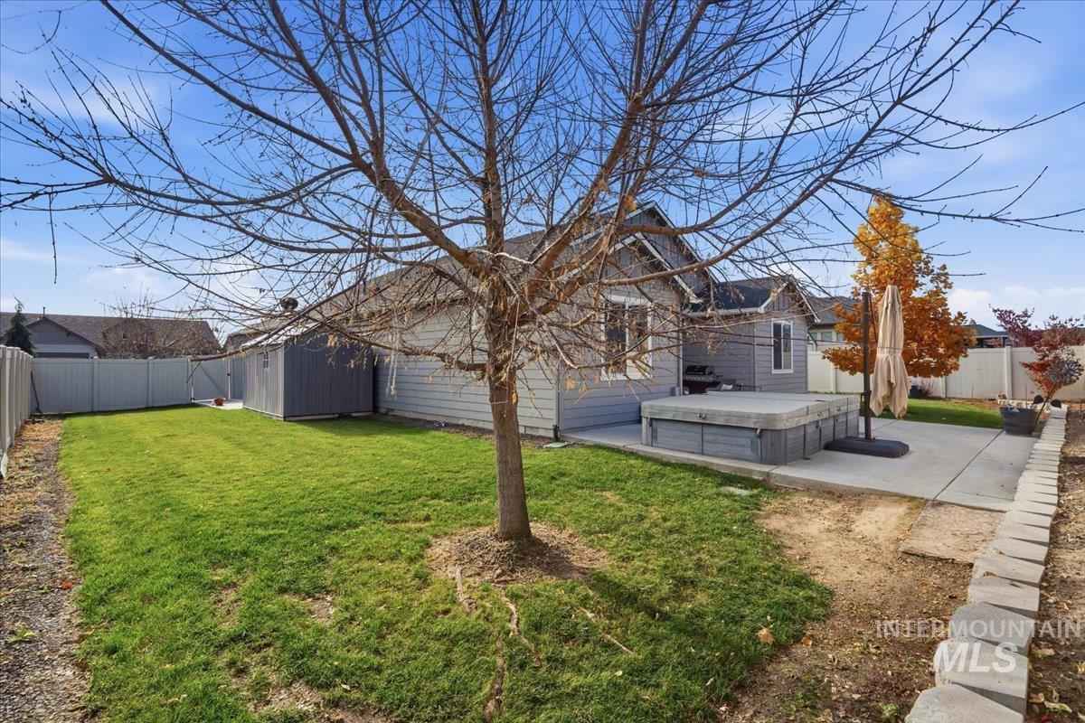 View of fenced backyard