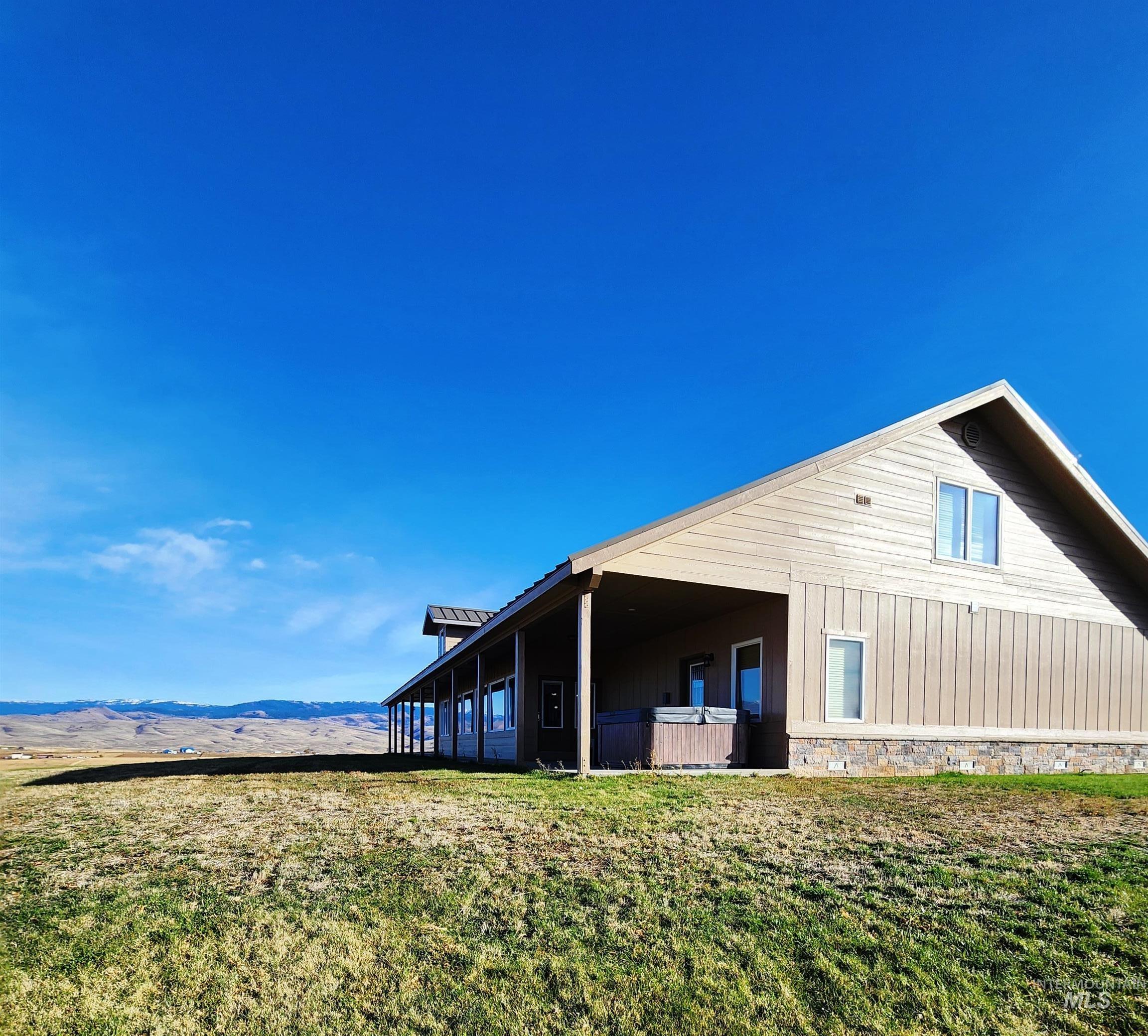 View of home's exterior featuring a balcony