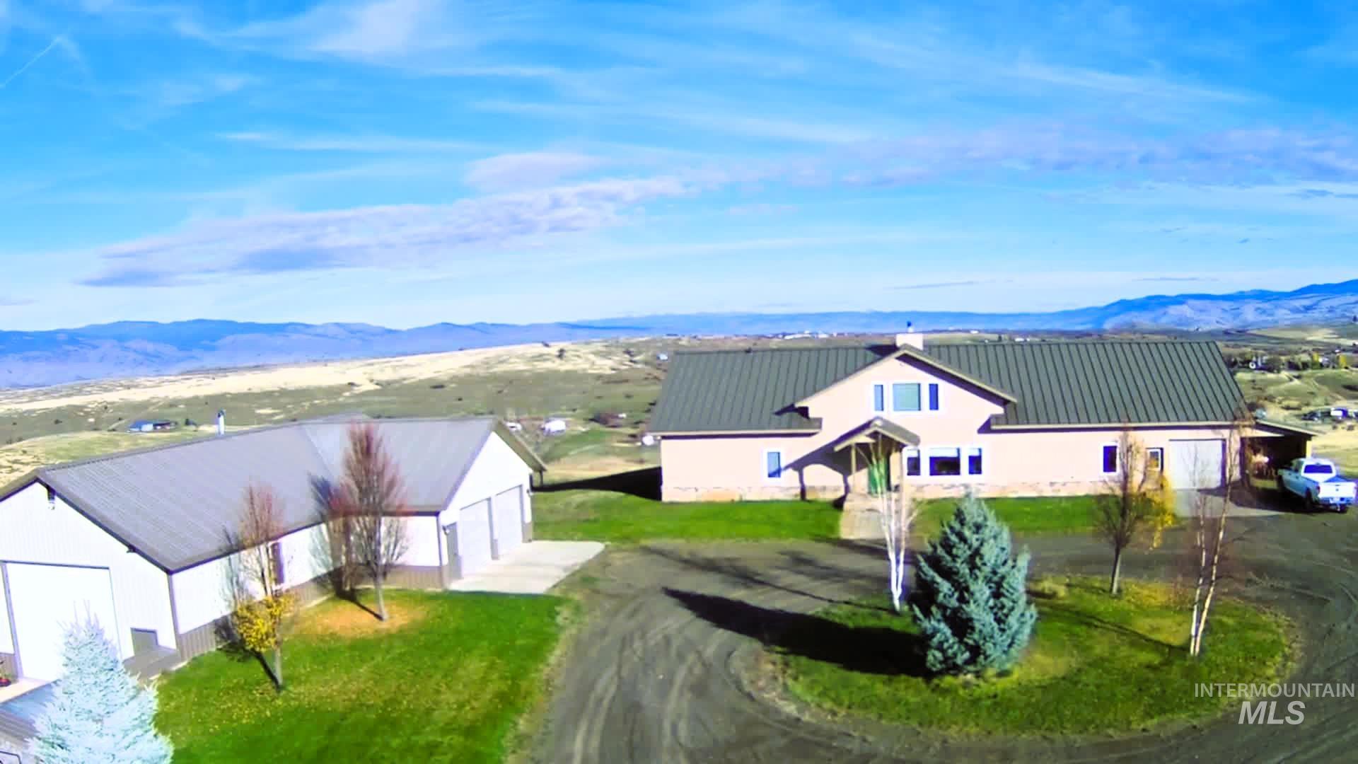 View from above of property featuring a mountainous background