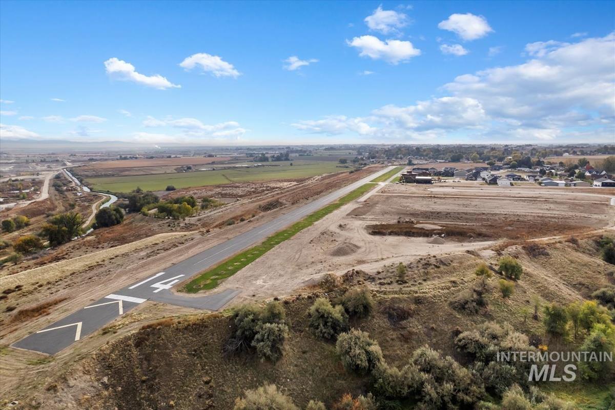 Aerial overview of property's location with rural landscape