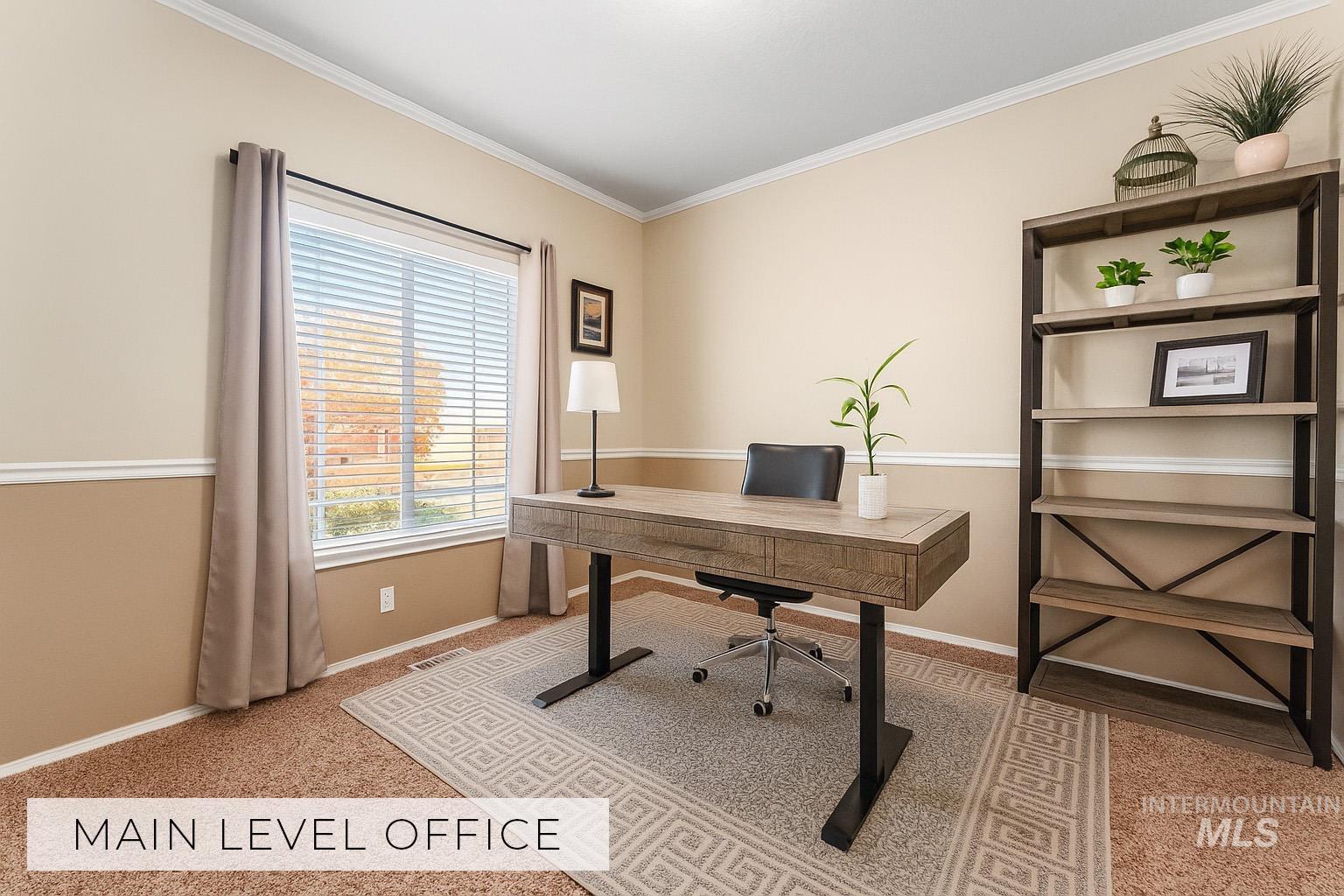 Home office featuring crown molding and light colored carpet