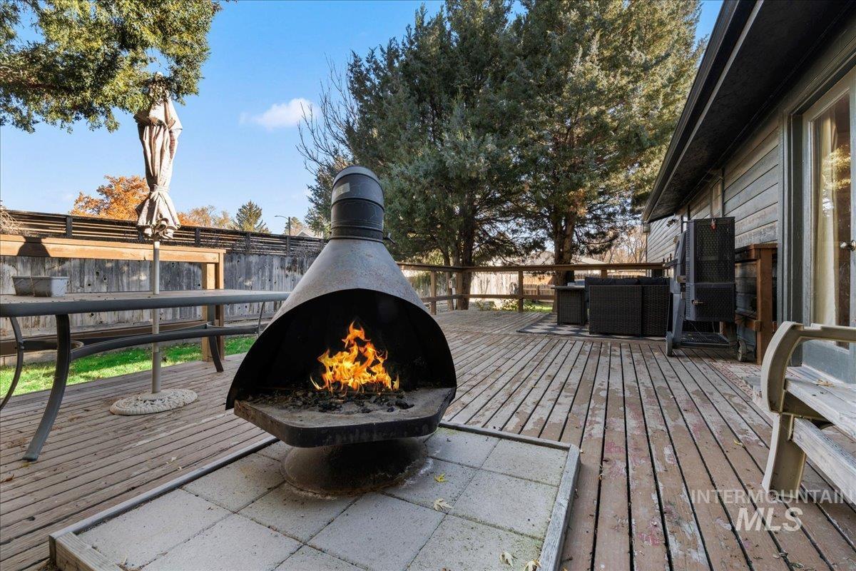 Deck with an outdoor fire pit