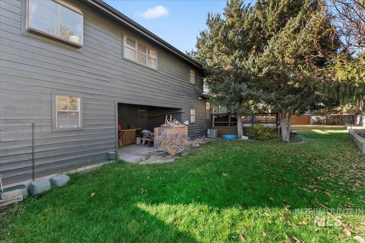 Rear view of house featuring a deck
