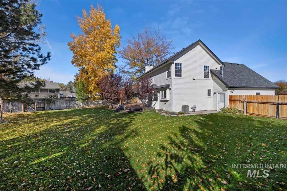 View of property exterior with a fenced backyard