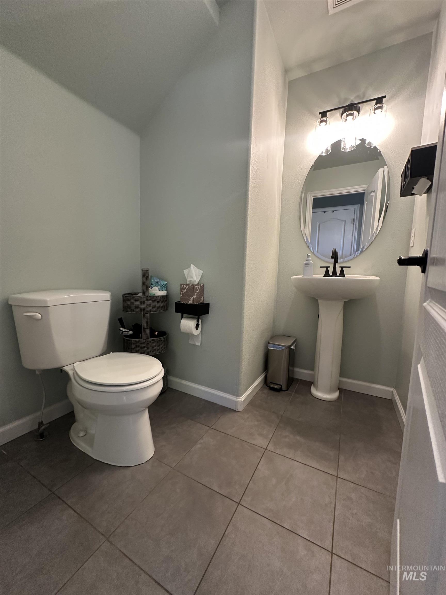 Bathroom featuring light tile patterned floors