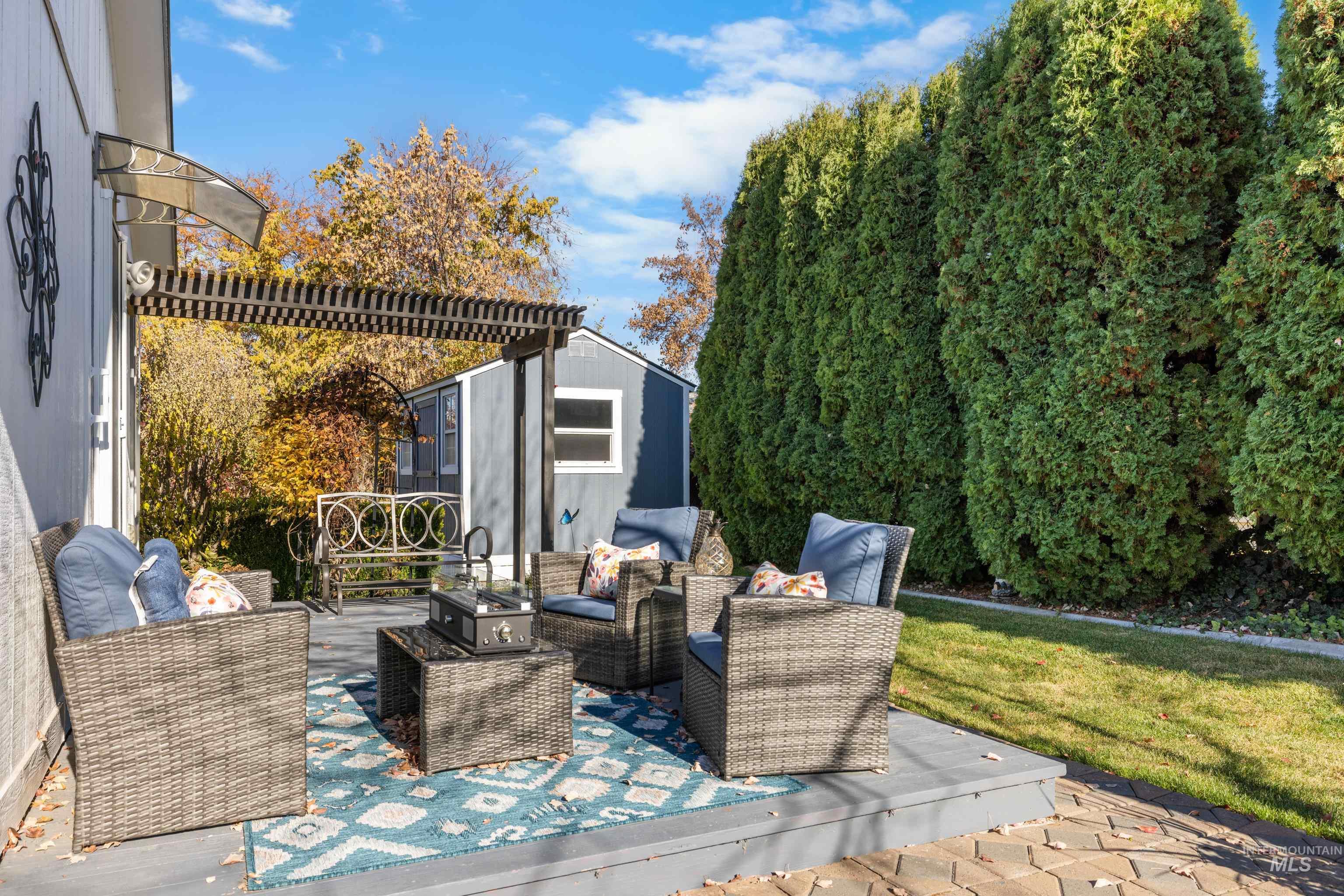 Deck featuring outdoor lounge area and a lawn