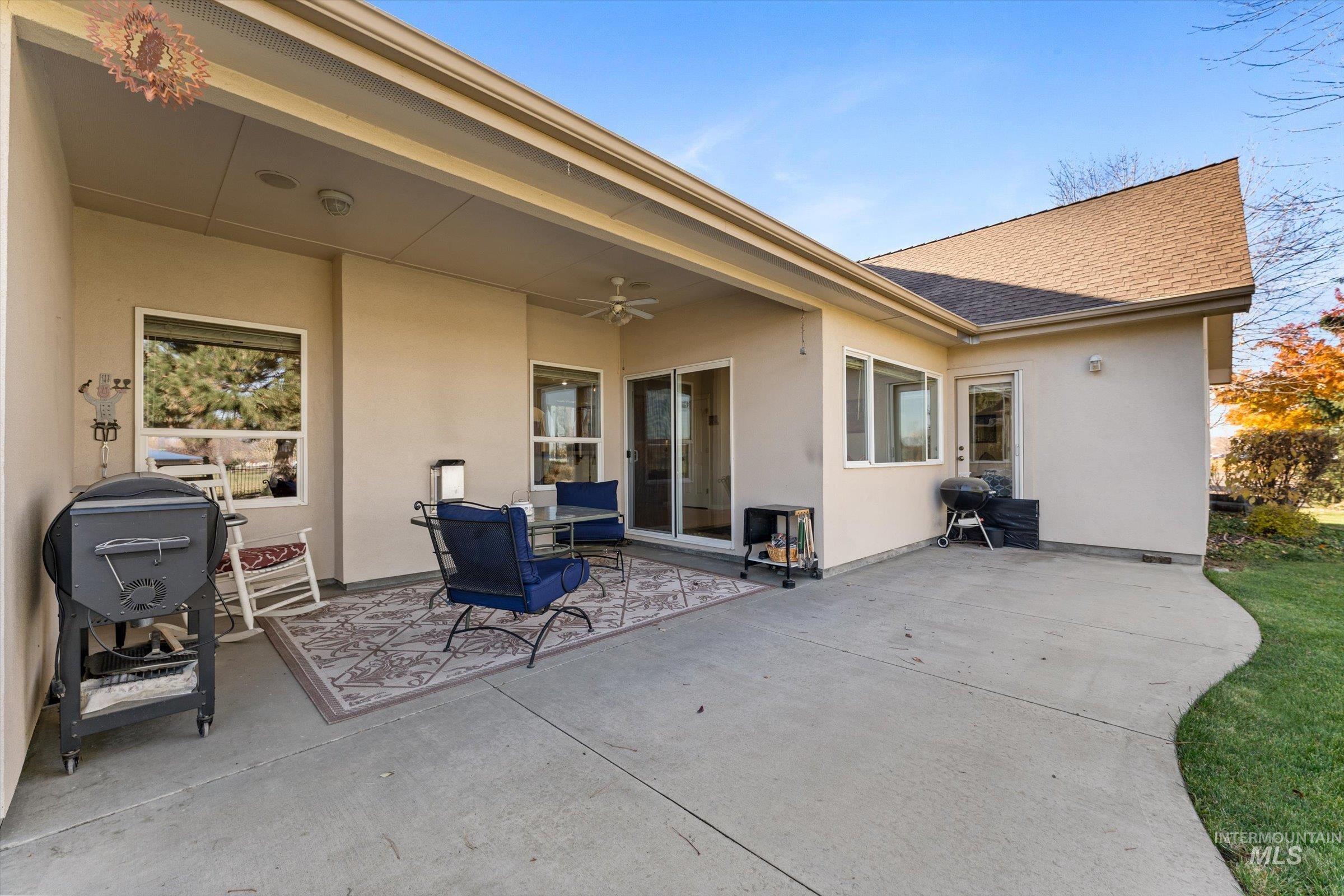 View of patio / terrace featuring ceiling fan and grilling area