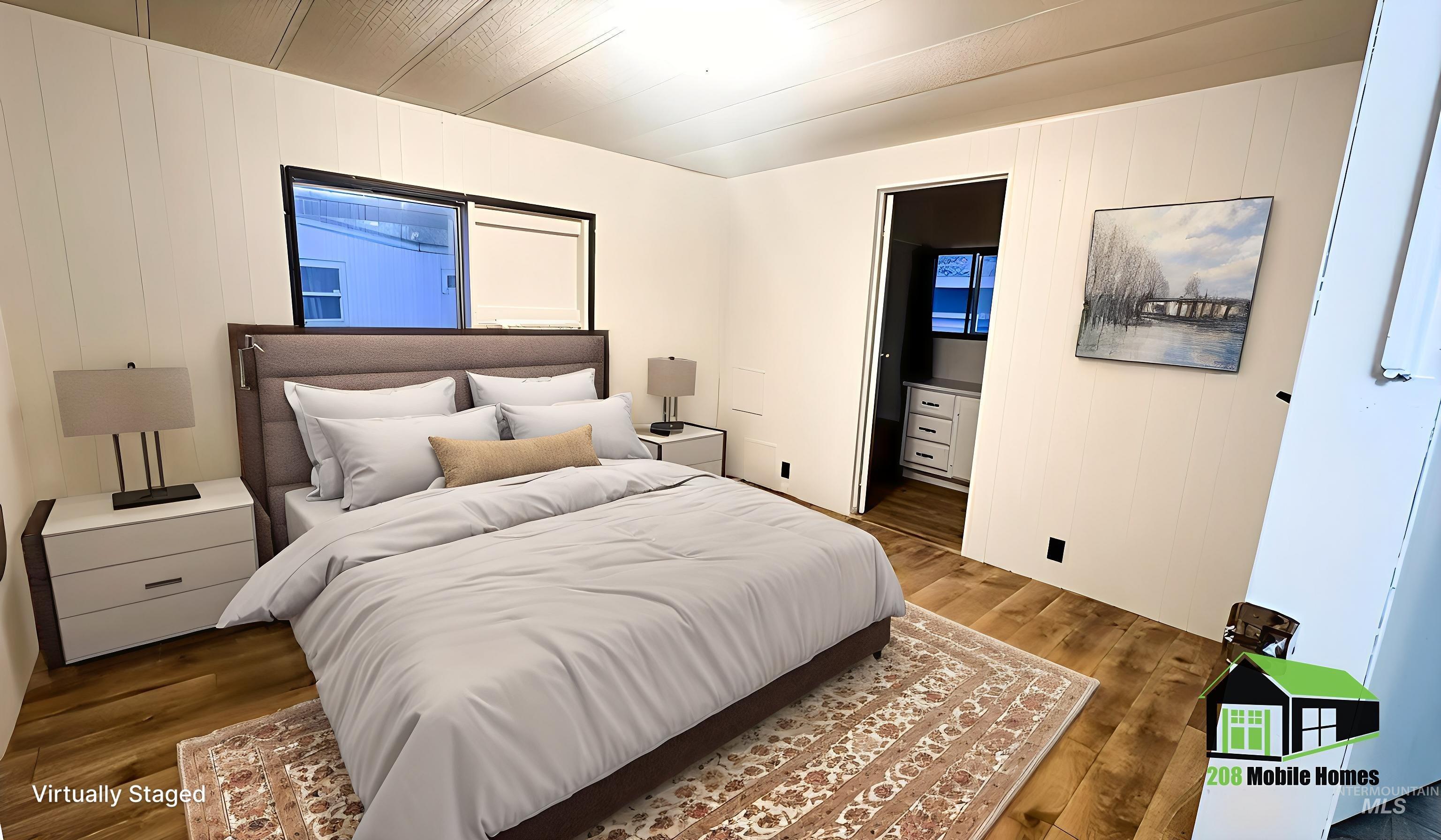 Bedroom with wood finished floors and wood walls
