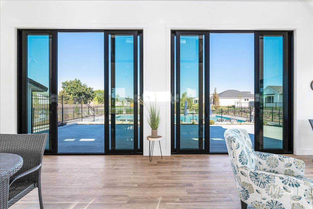 Doorway to outside featuring wood finished floors