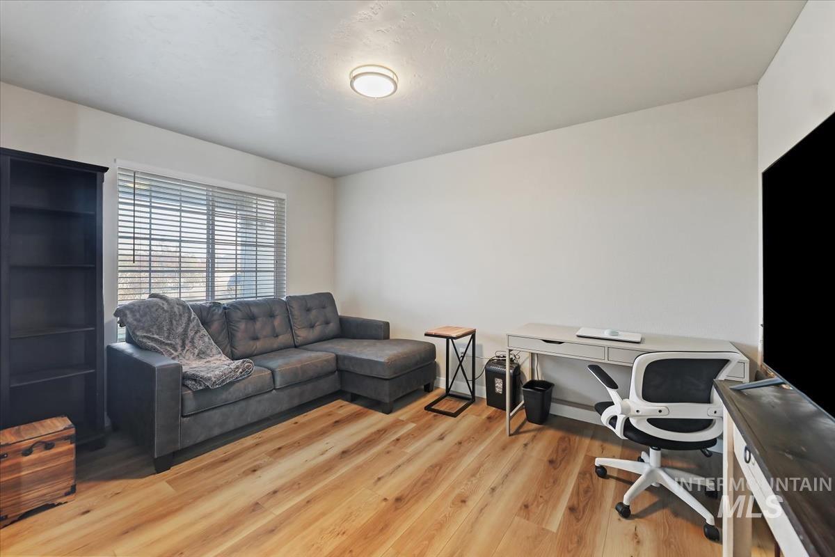Home office featuring light wood-type flooring