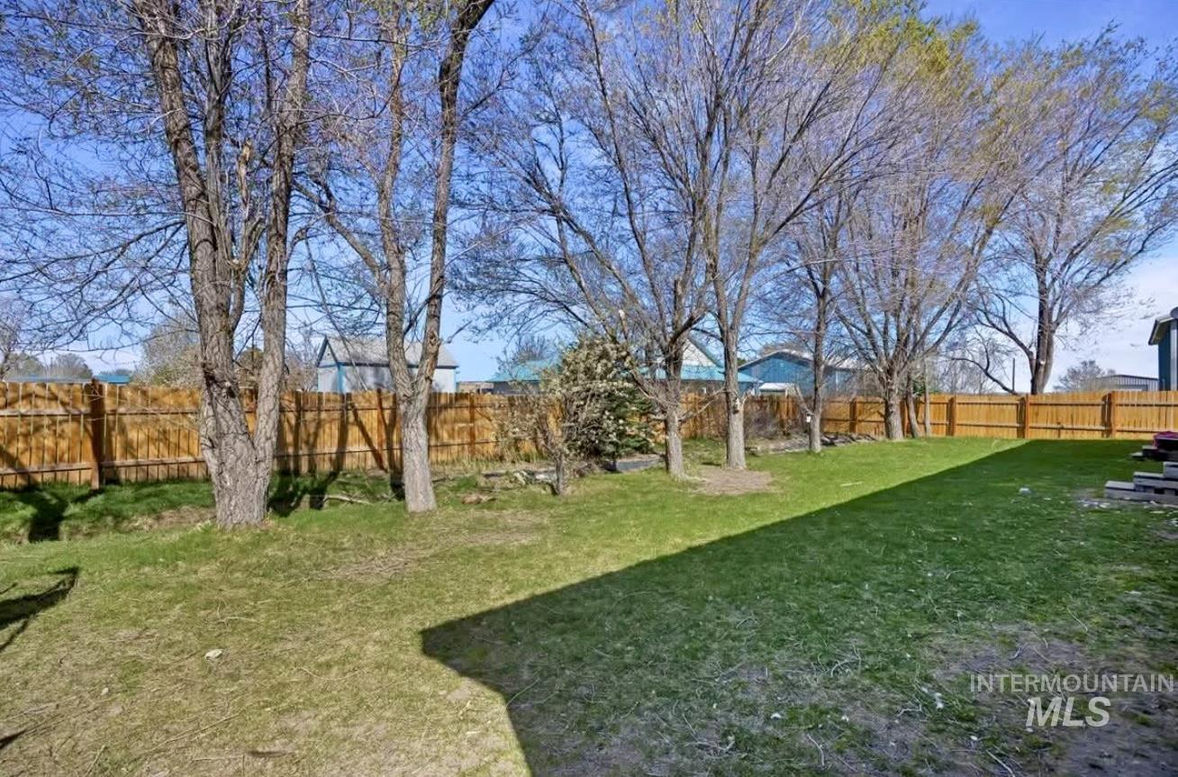 View of fenced backyard