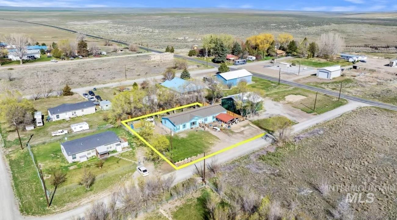 Aerial overview of property's location featuring property boundaries highlighted