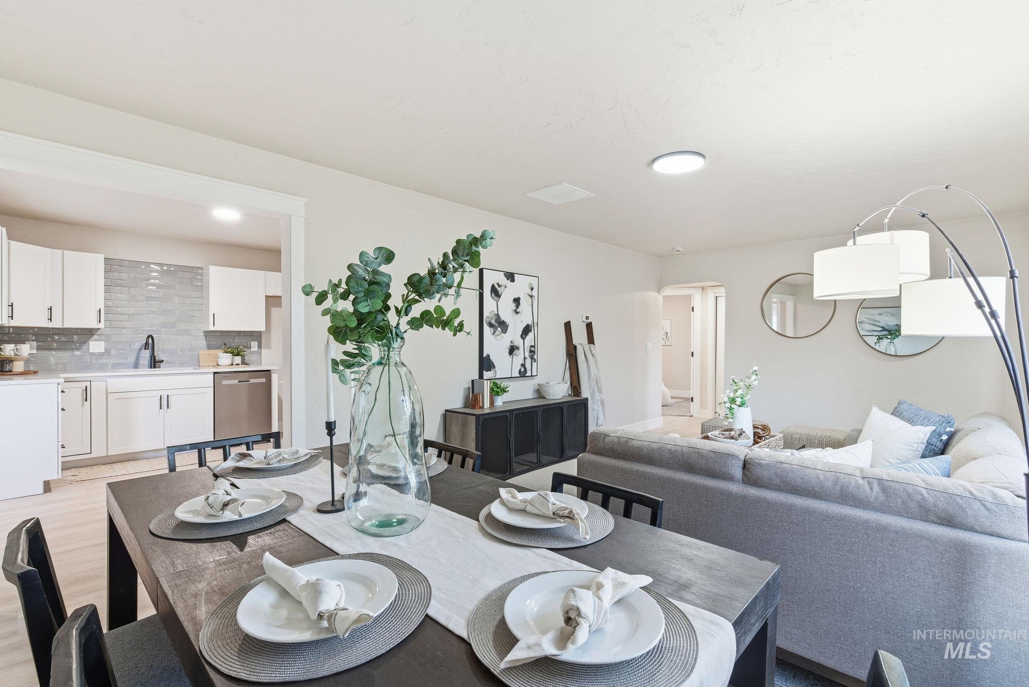 Dining area with light wood finished floors