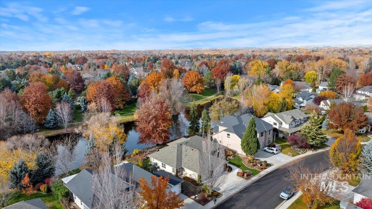 View of property location featuring nearby suburban area and a large body of water