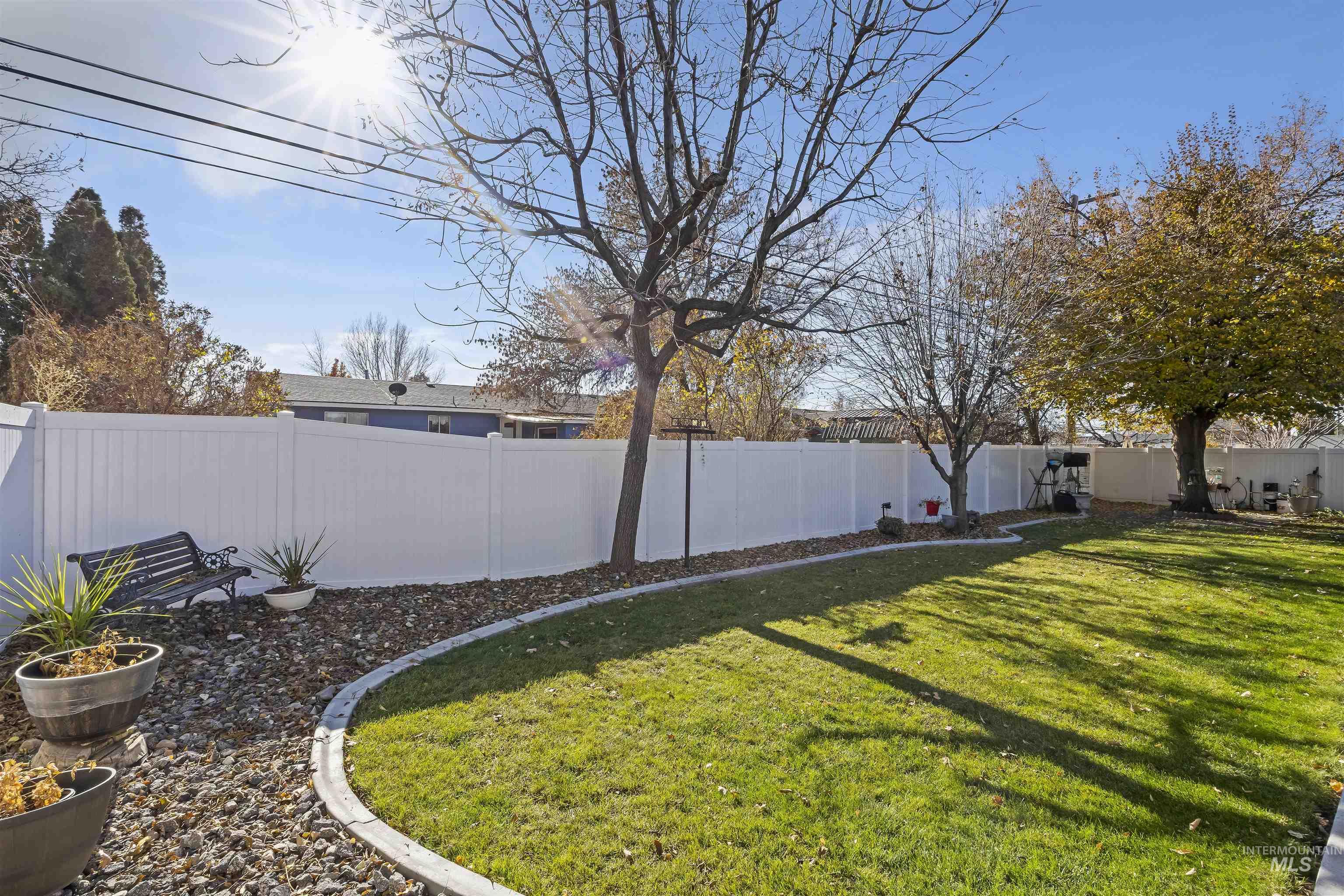 View of fenced backyard