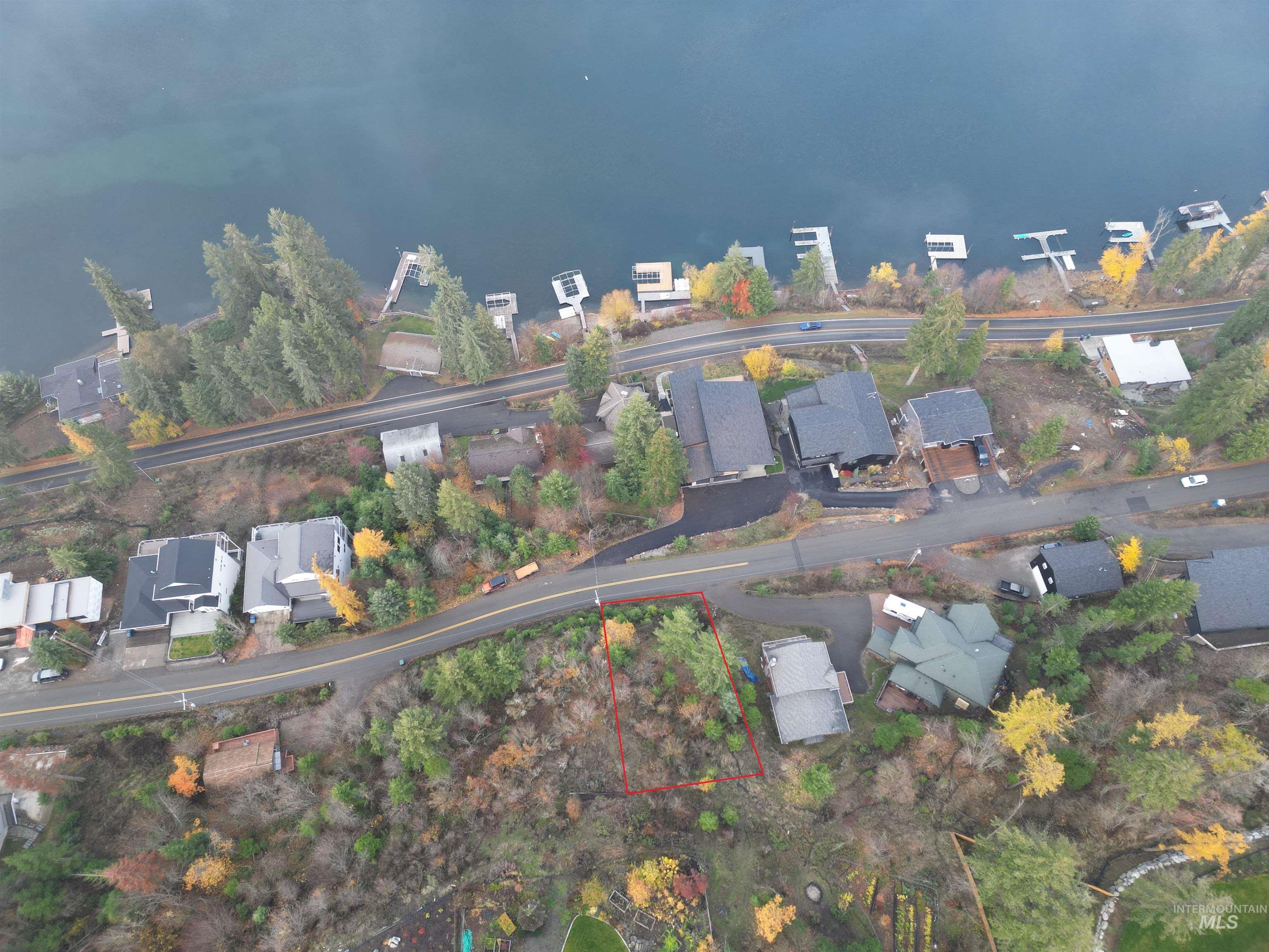 Aerial view of residential area with property boundaries highlighted