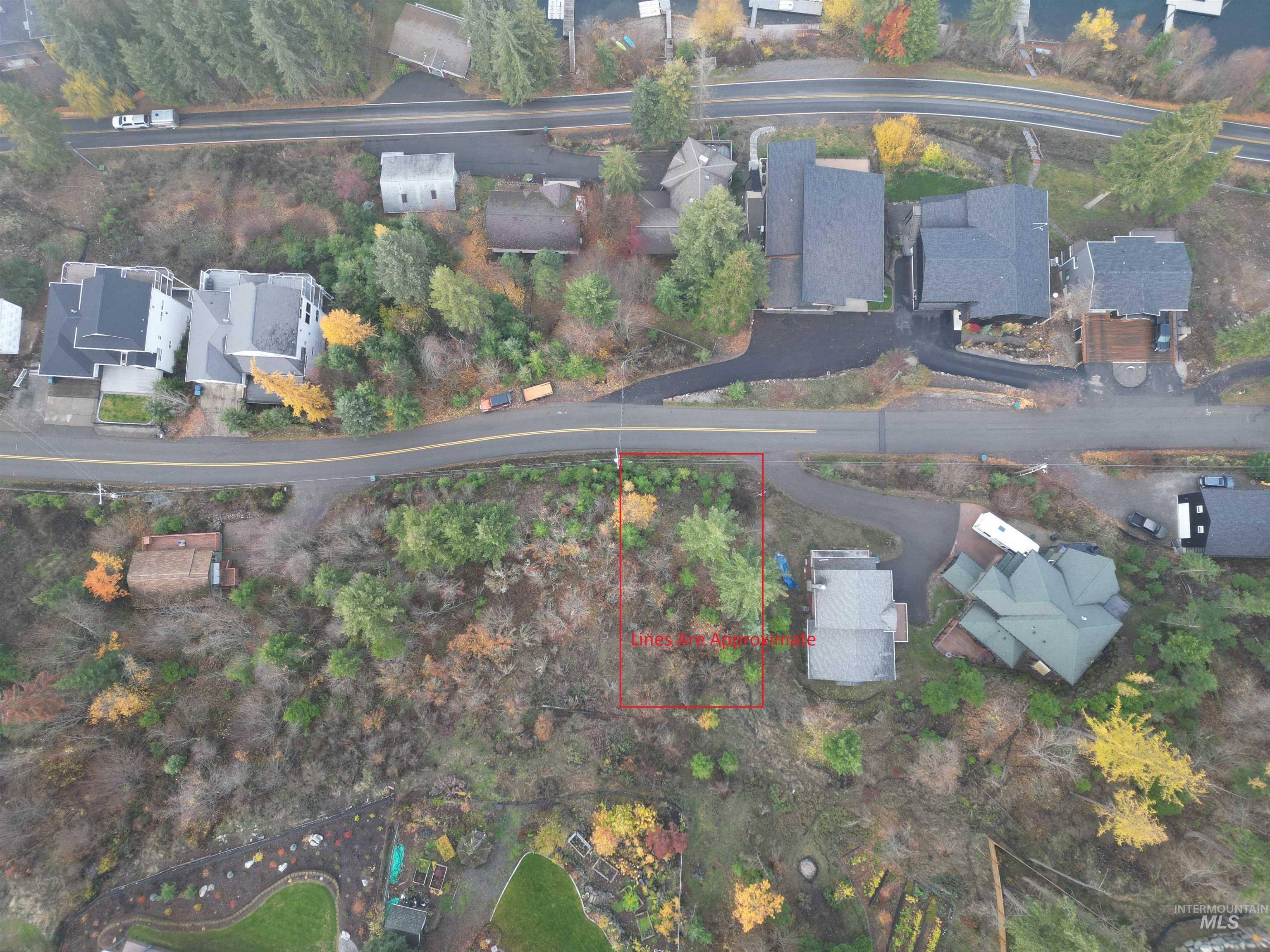 Aerial view of residential area with property boundaries highlighted