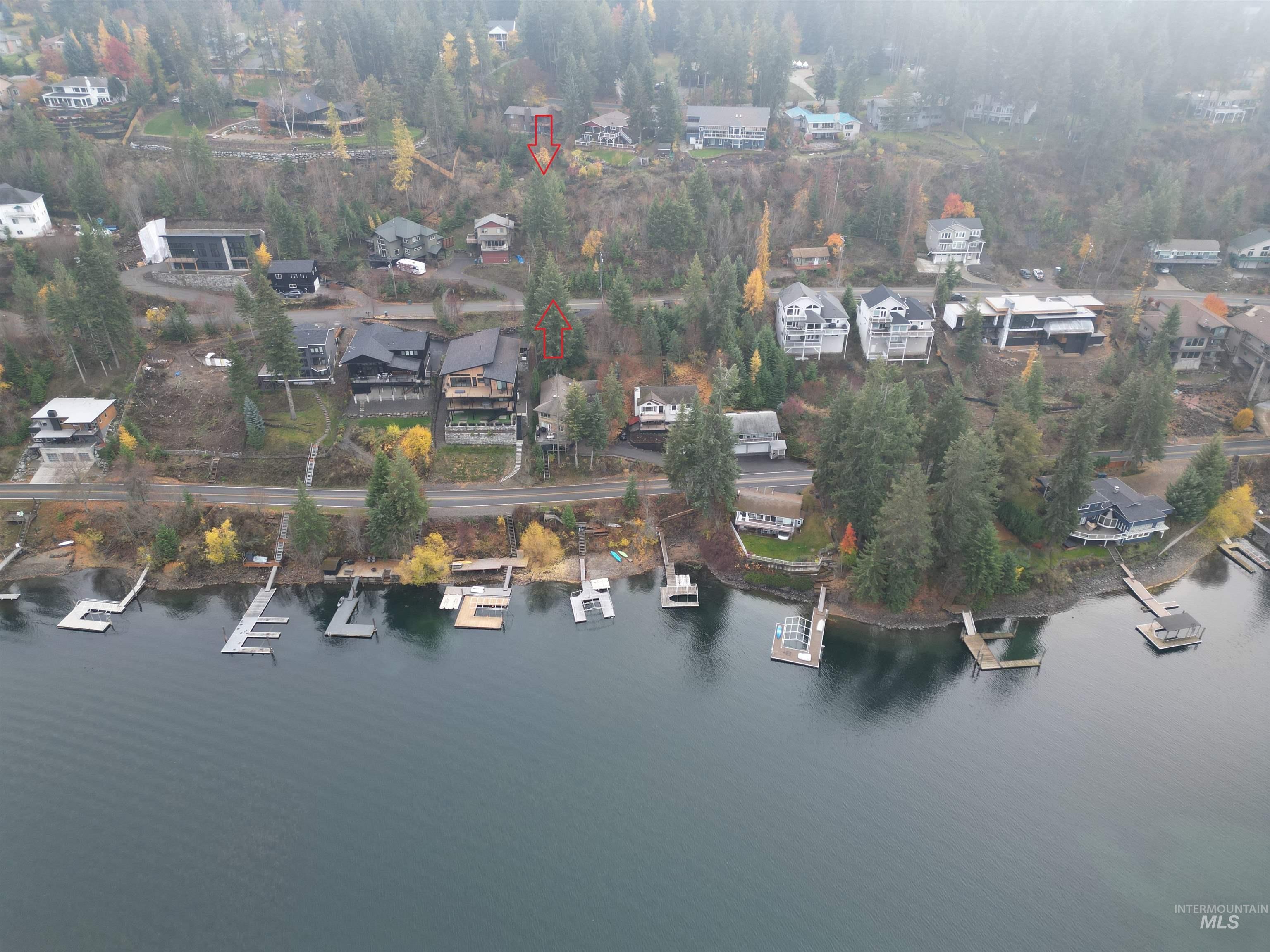 Aerial view of property's location with nearby suburban area