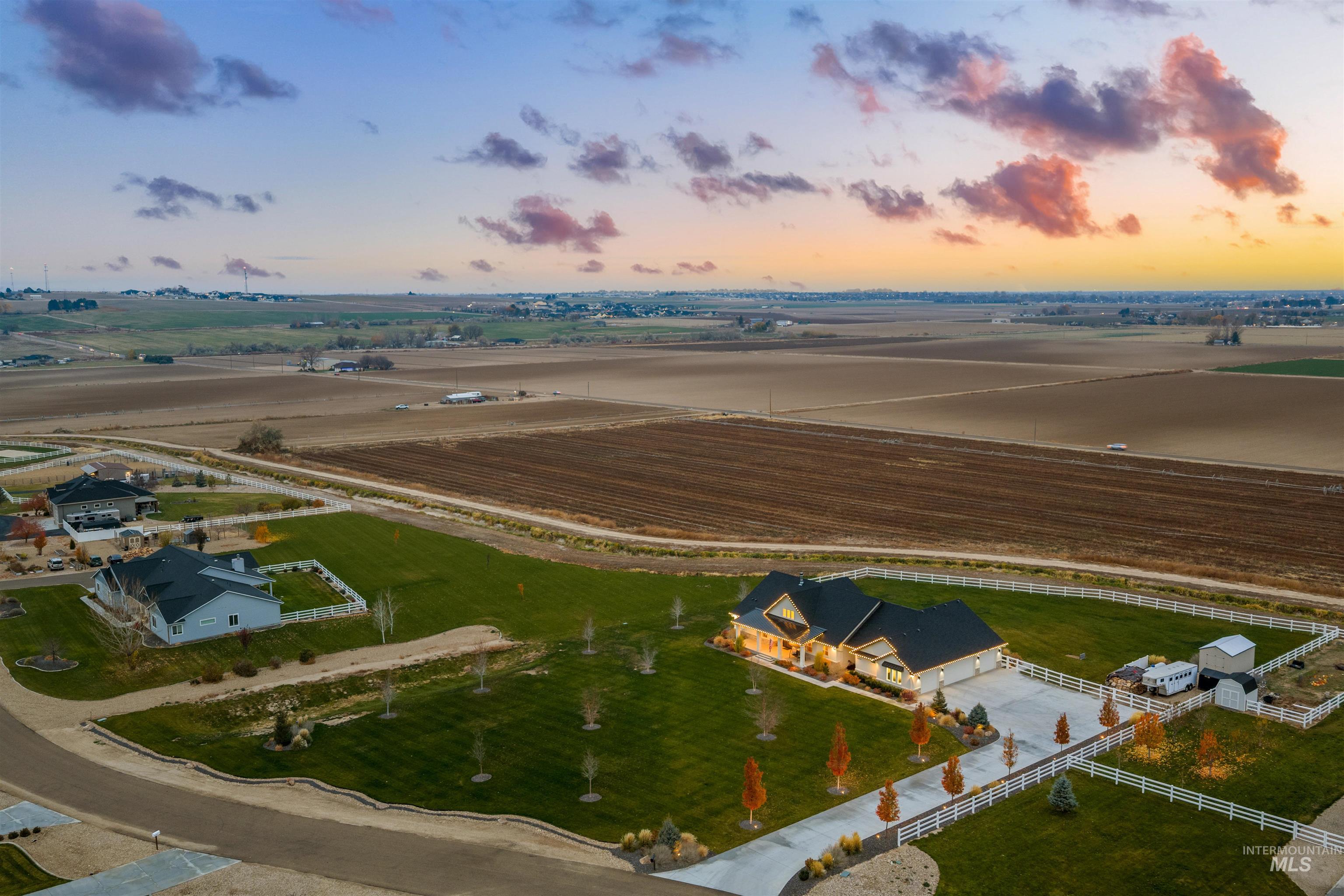 View of rural area featuring large plots for crops