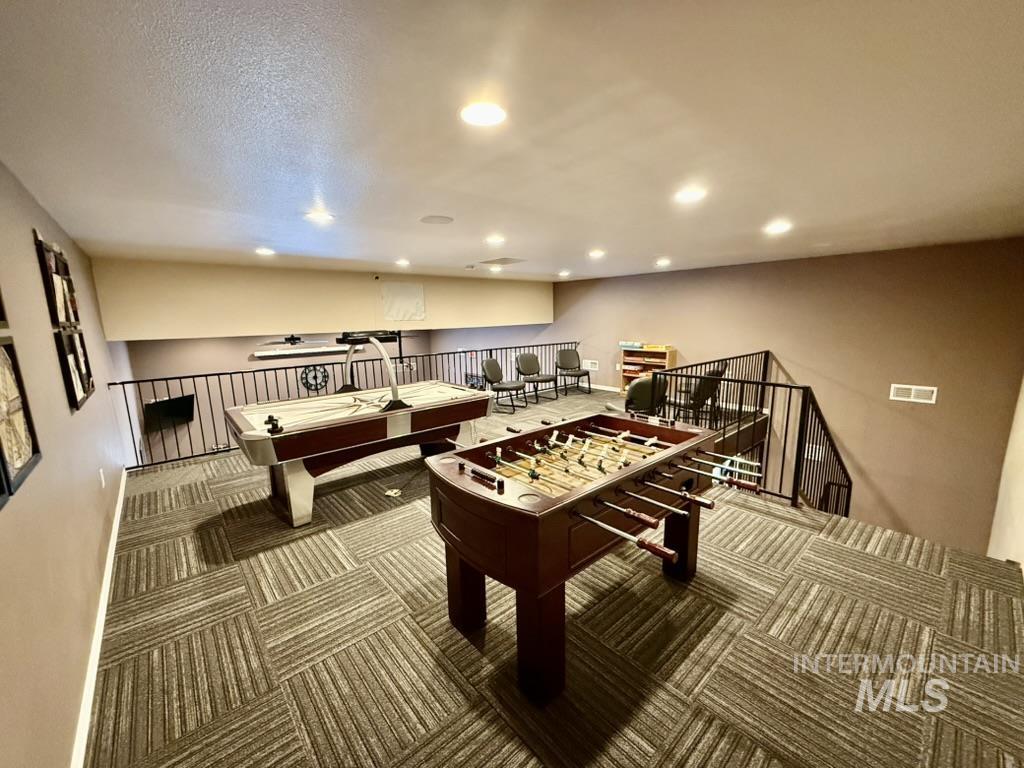 Rec room with recessed lighting and pool table