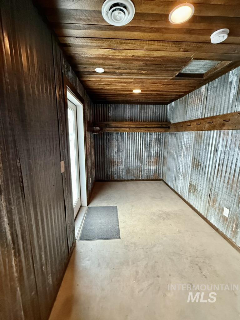 Basement featuring wooden ceiling