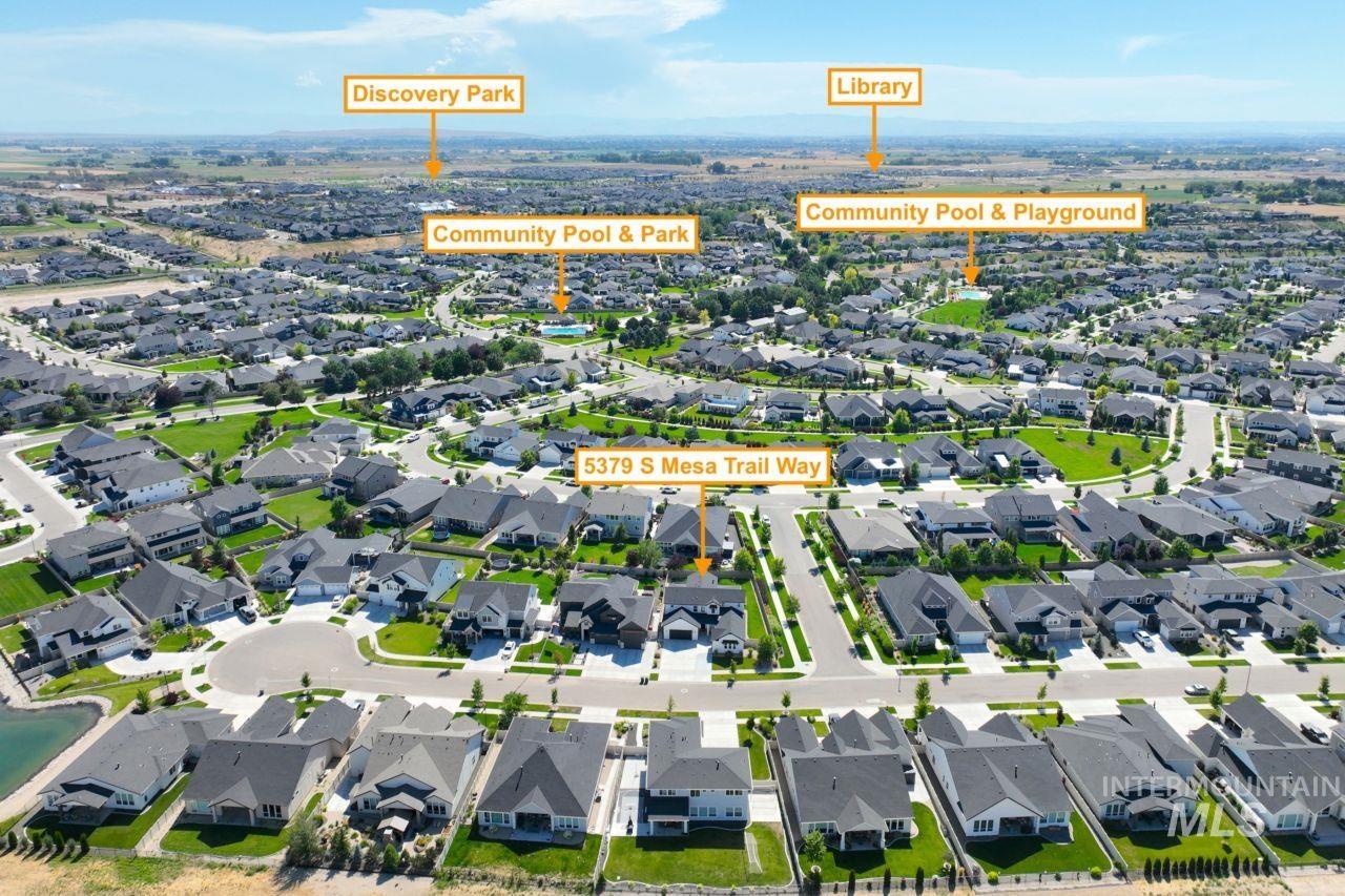 View of property location with nearby suburban area