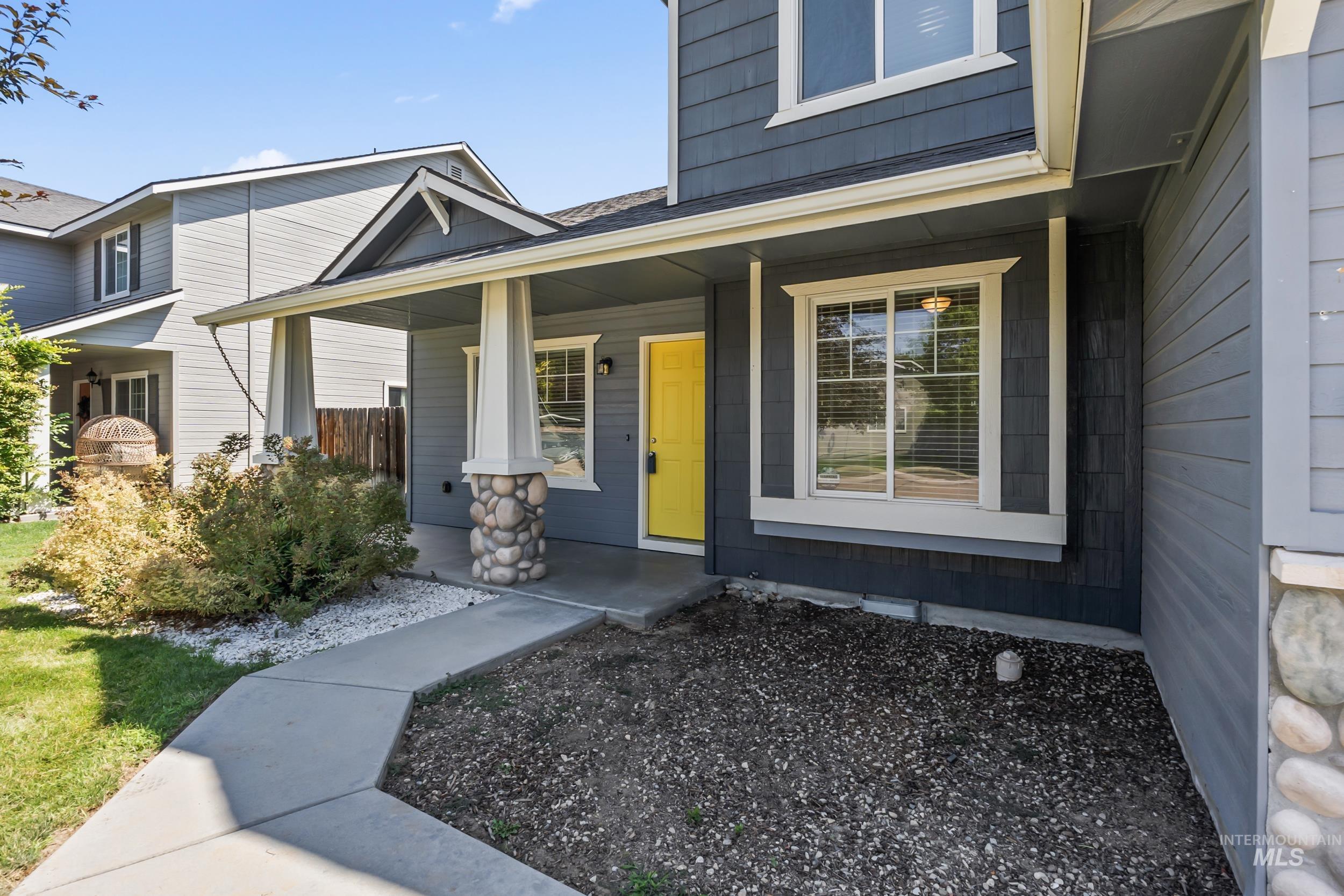 Property entrance with a porch