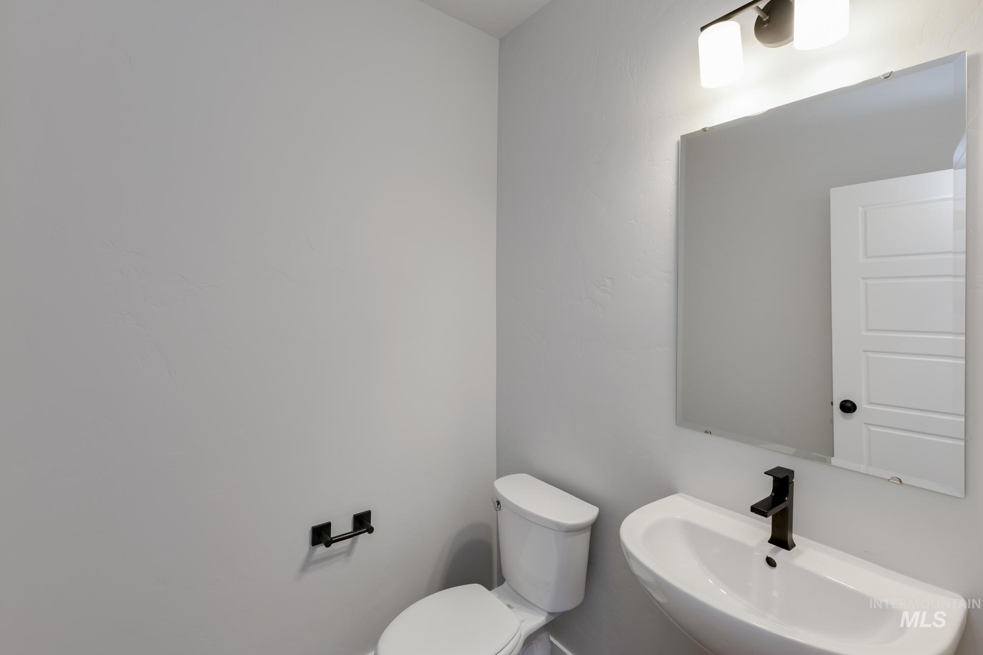 Bathroom with a sink and toilet