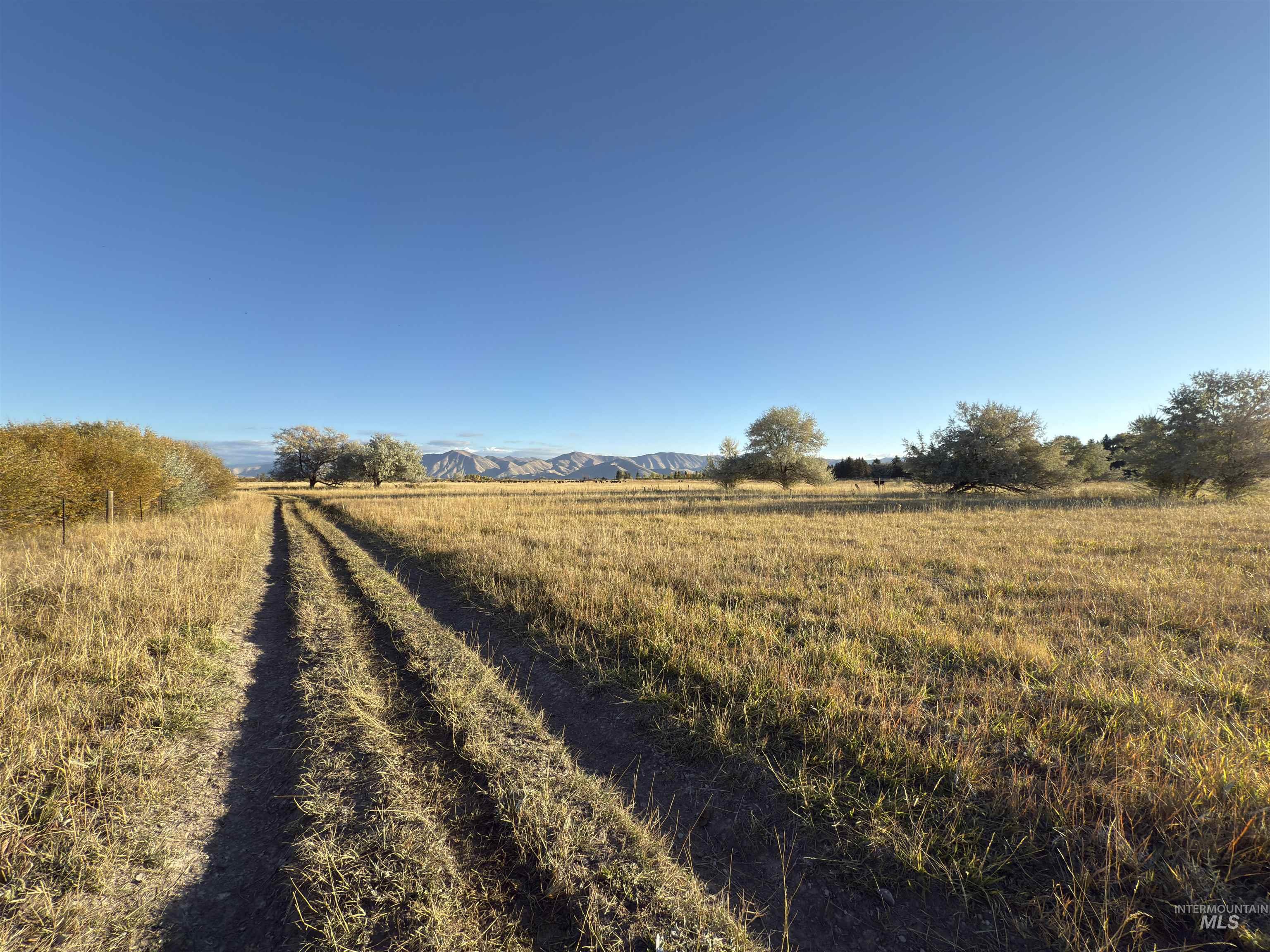 View of road featuring a view of countryside and a mountain view