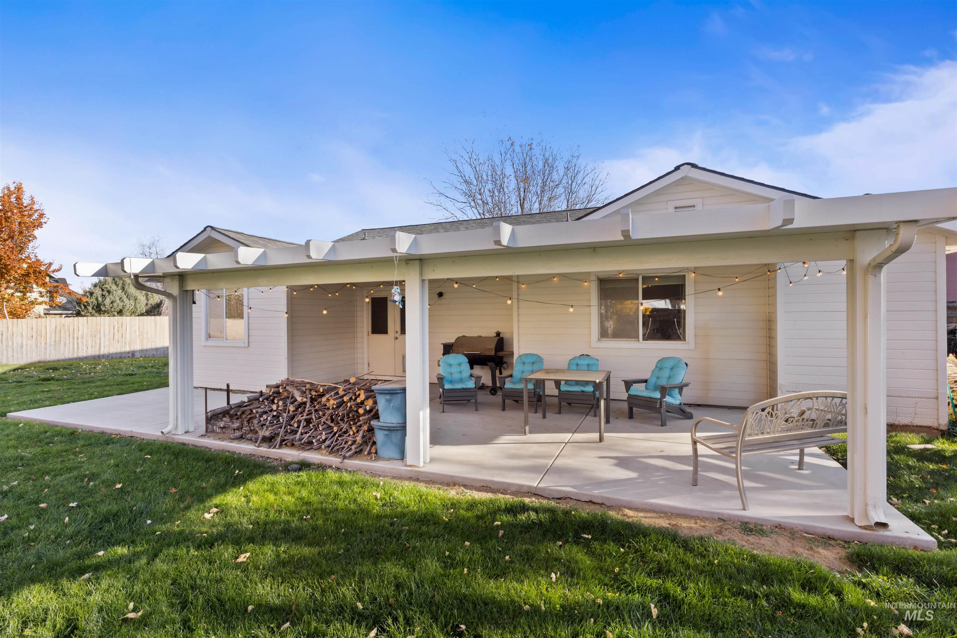 Rear view of property with a patio