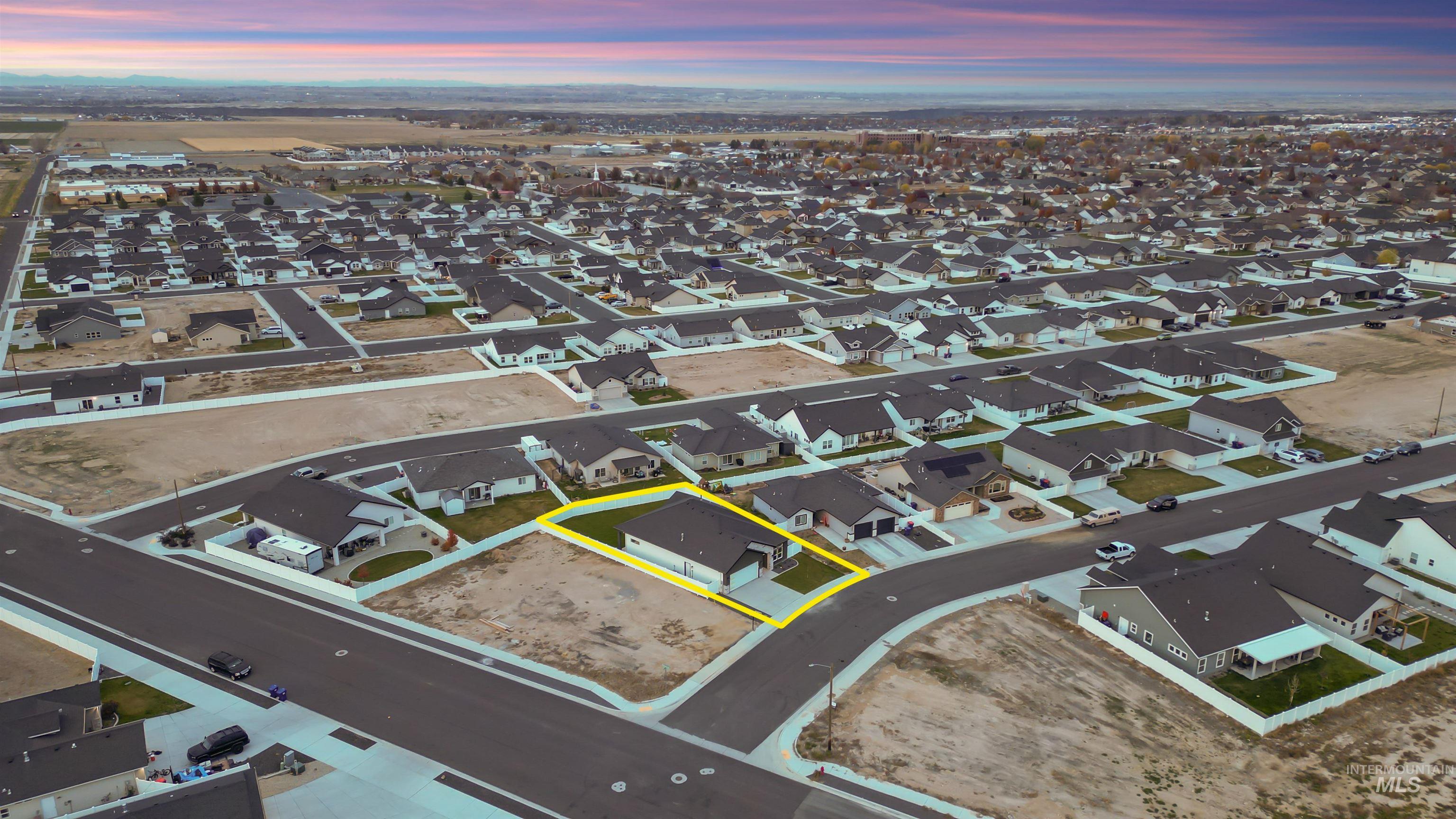Aerial perspective of suburban area with property boundaries highlighted