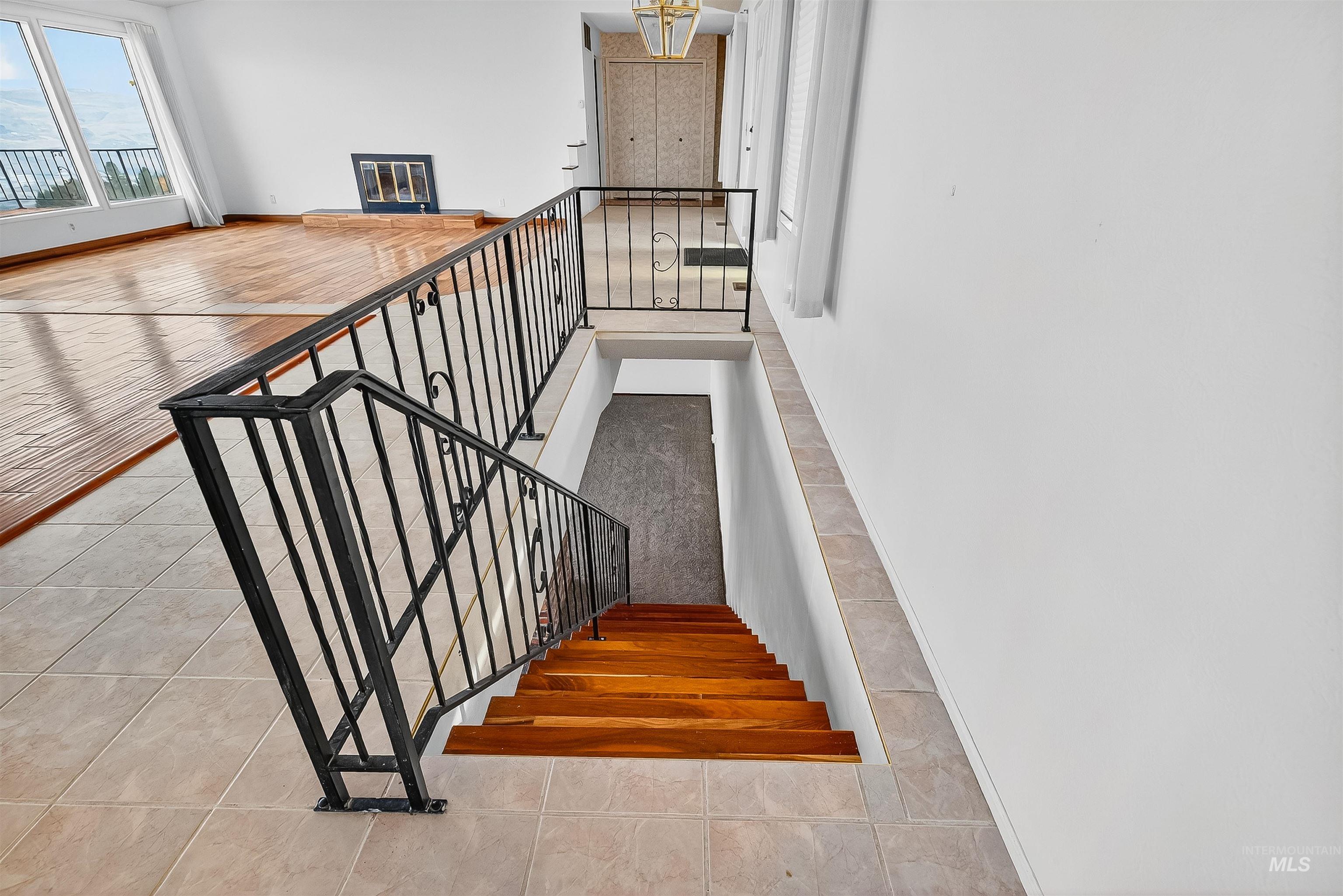 Staircase with tile patterned flooring