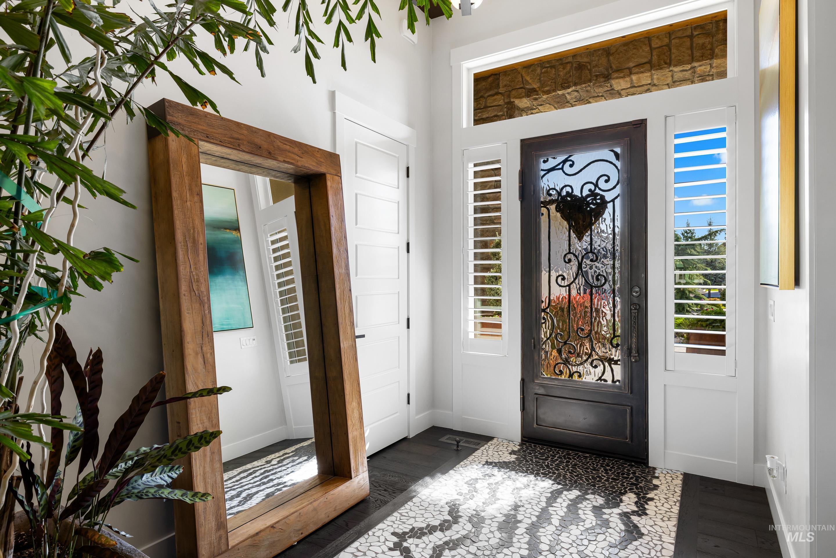 Entryway with wood finished floors