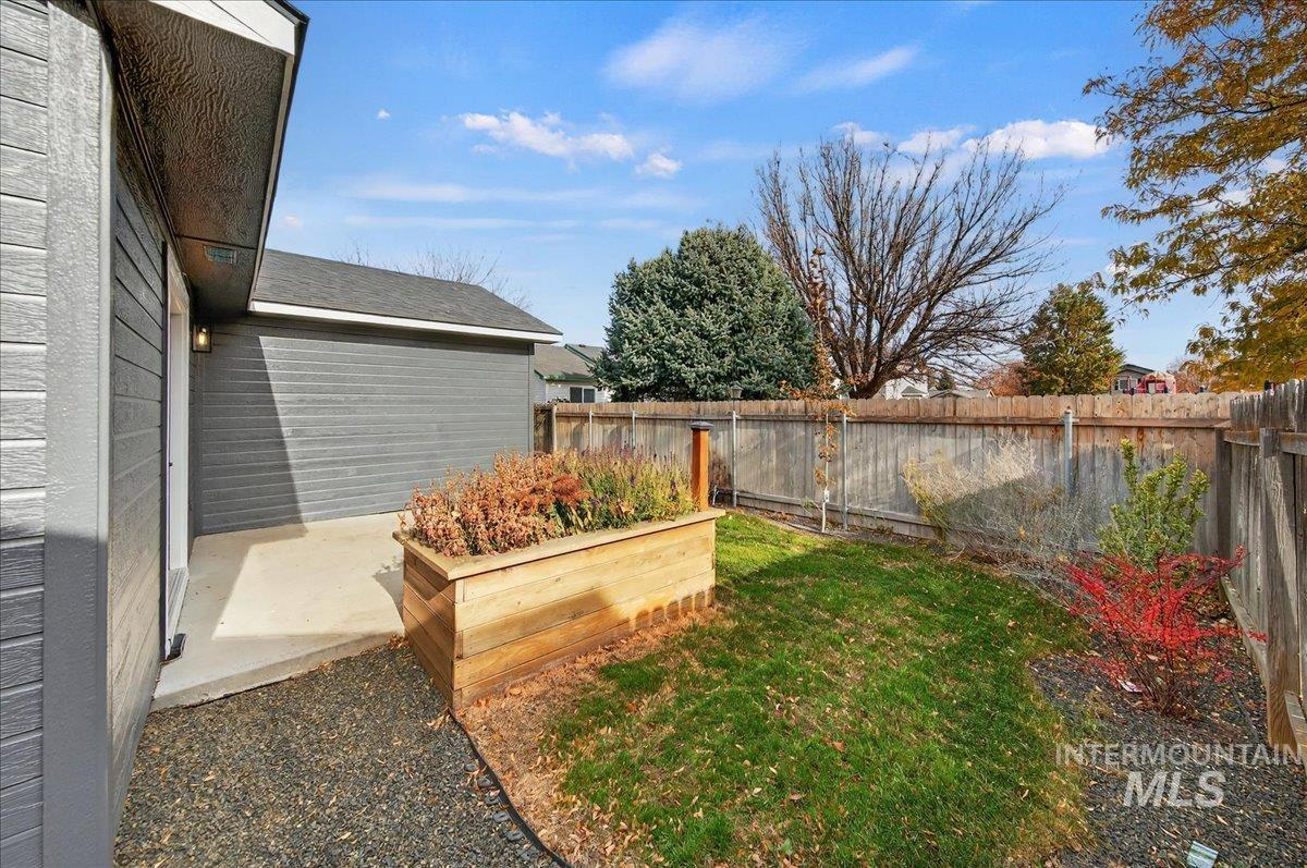 View of fenced backyard